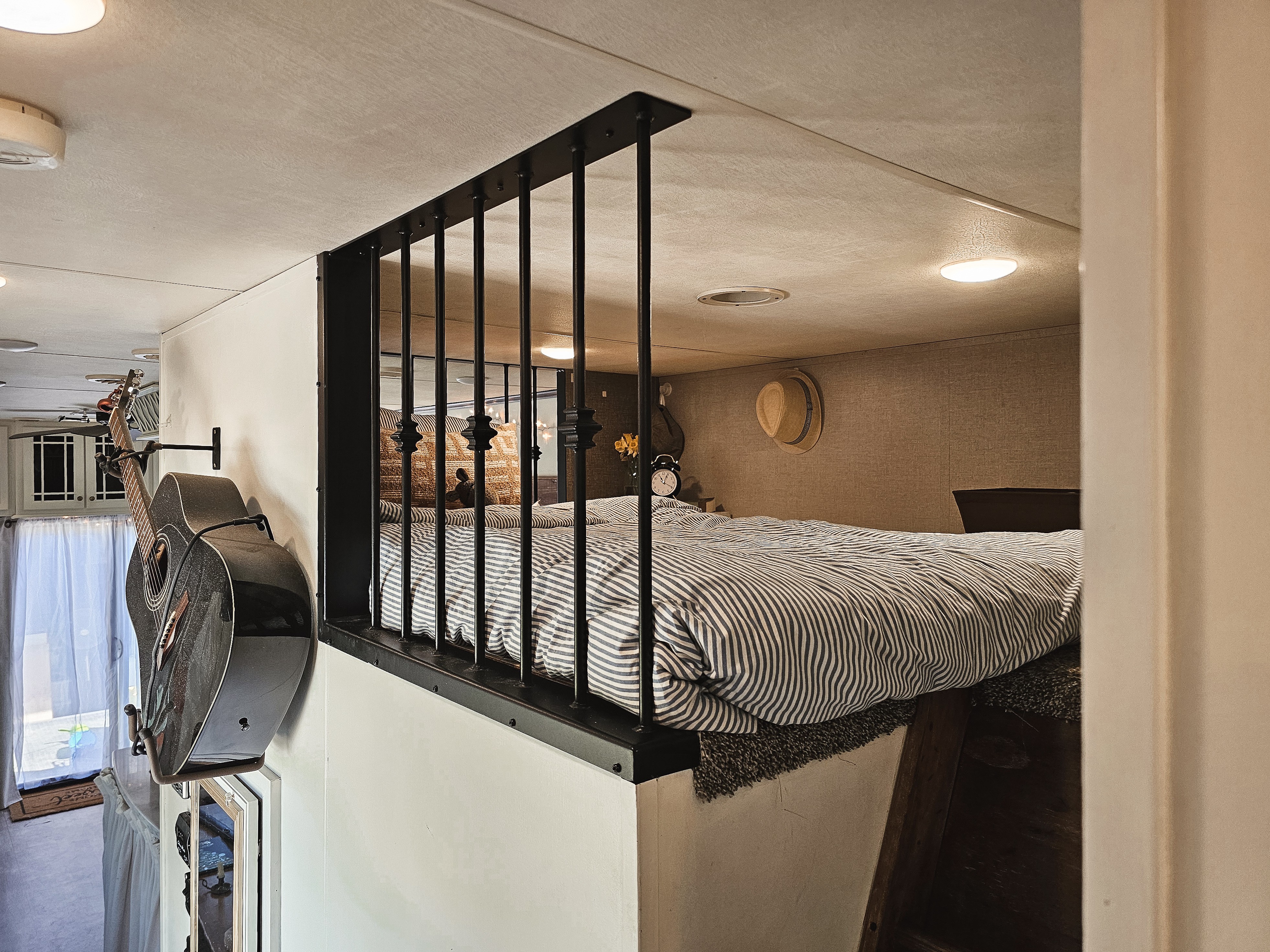 The lofted bedroom inside Bibi and JC Barringer's KZ Durango Gold fifth wheel.