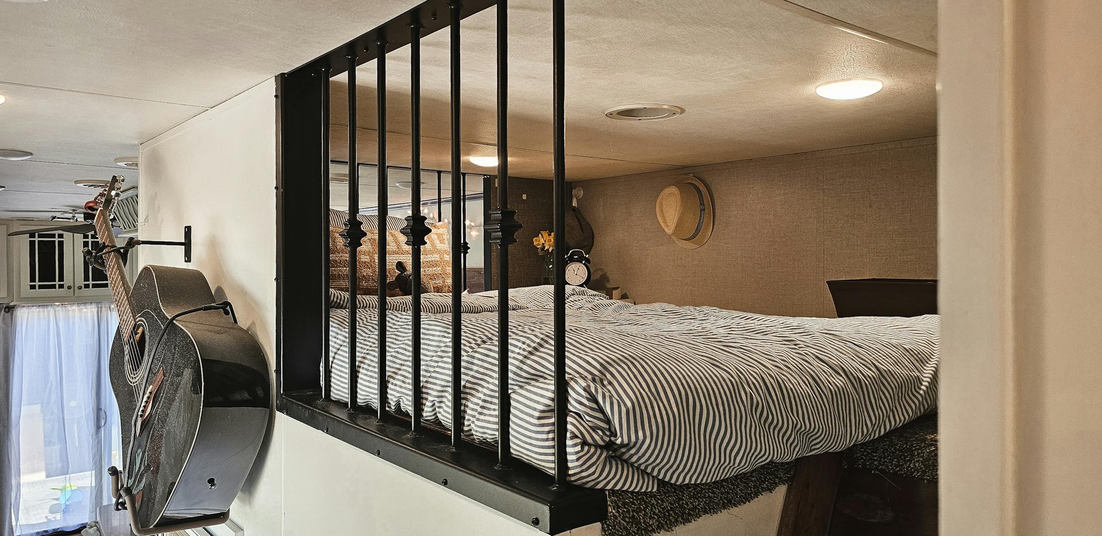 The lofted bedroom inside Bibi and JC Barringer's KZ Durango Gold fifth wheel.