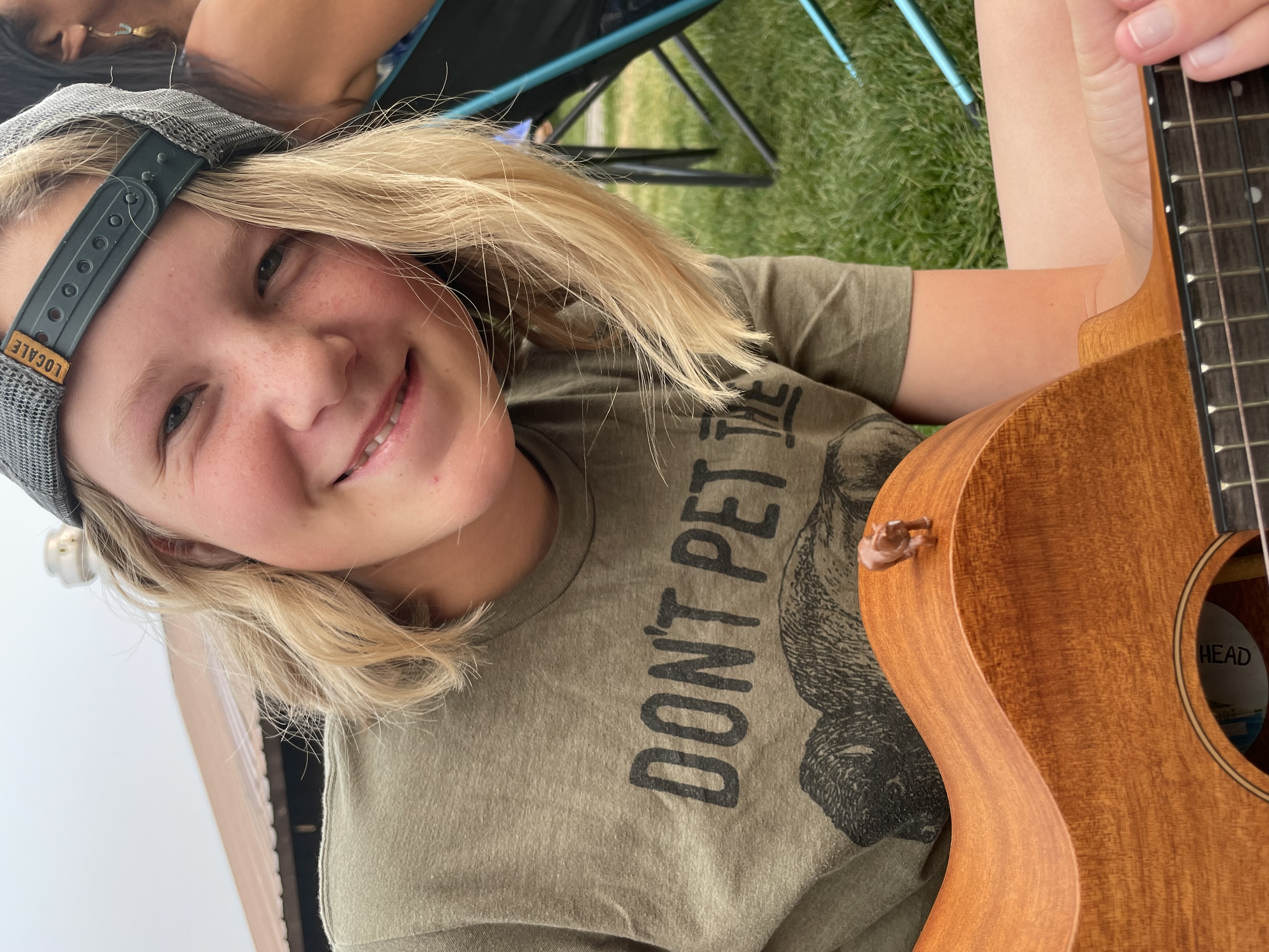 Lilya Blue plays the guitar.