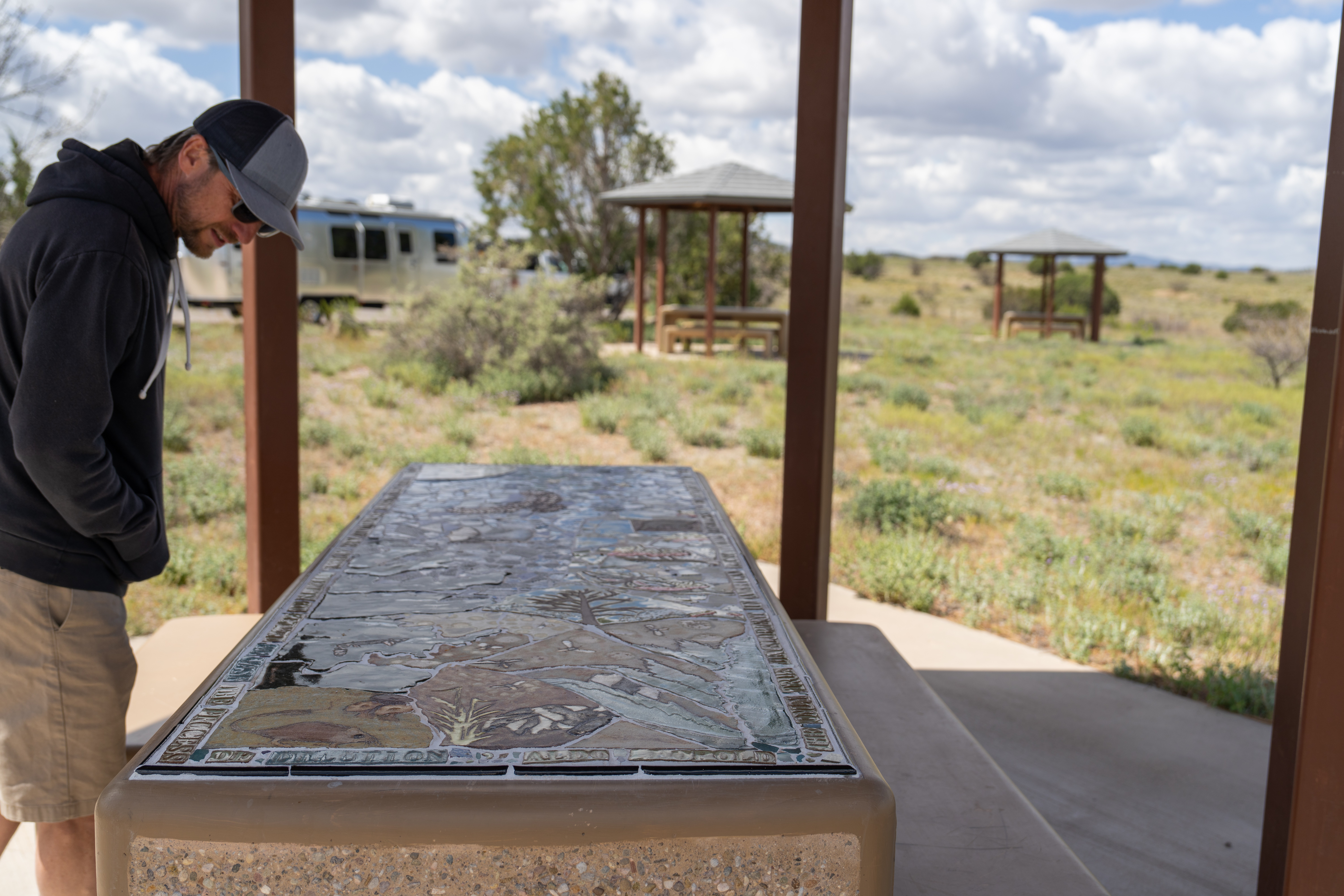 Lenny Blue observing information about Gila National Forest.
