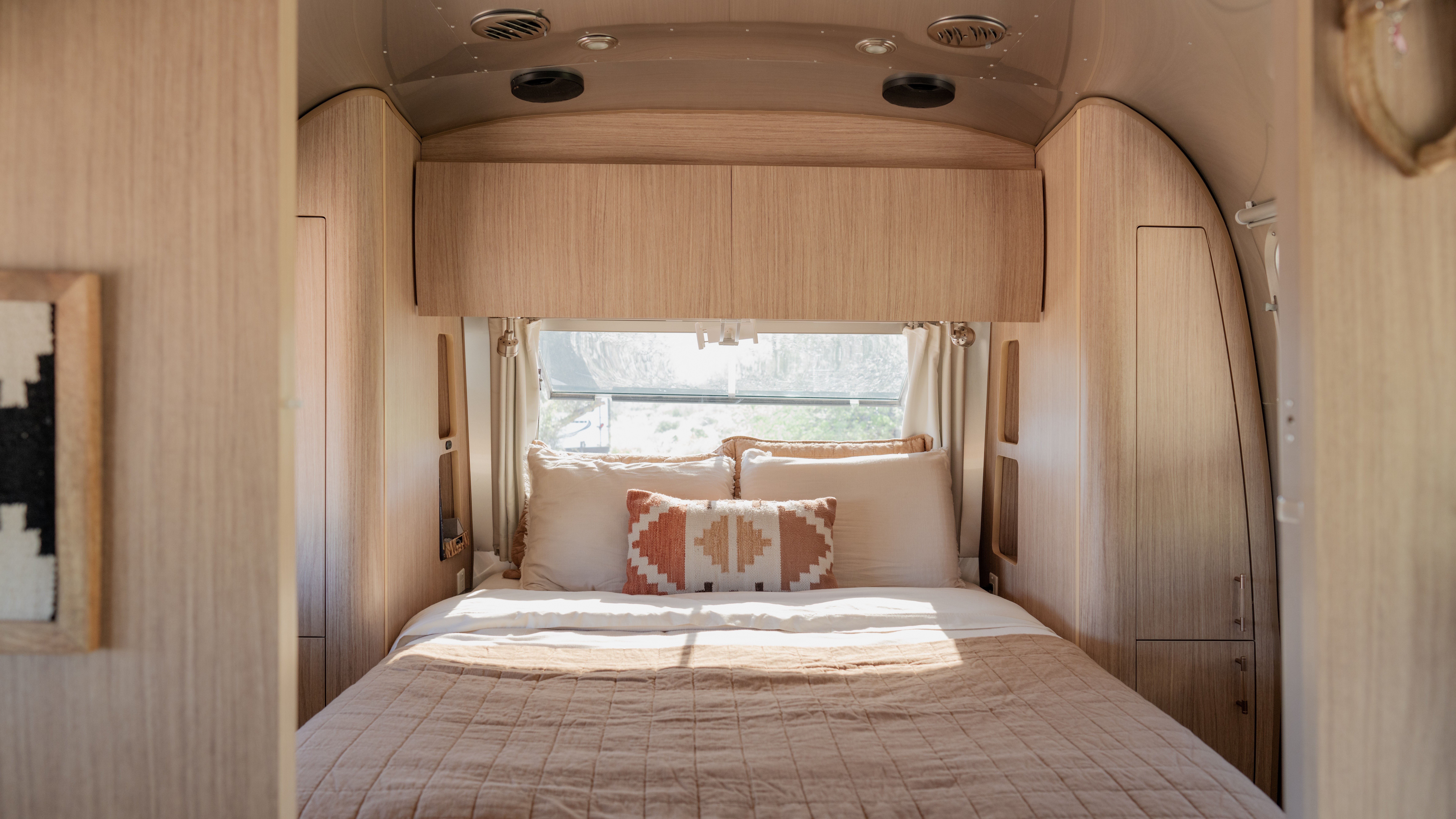 The bedroom inside Karen Blue's Airstream Flying Cloud.