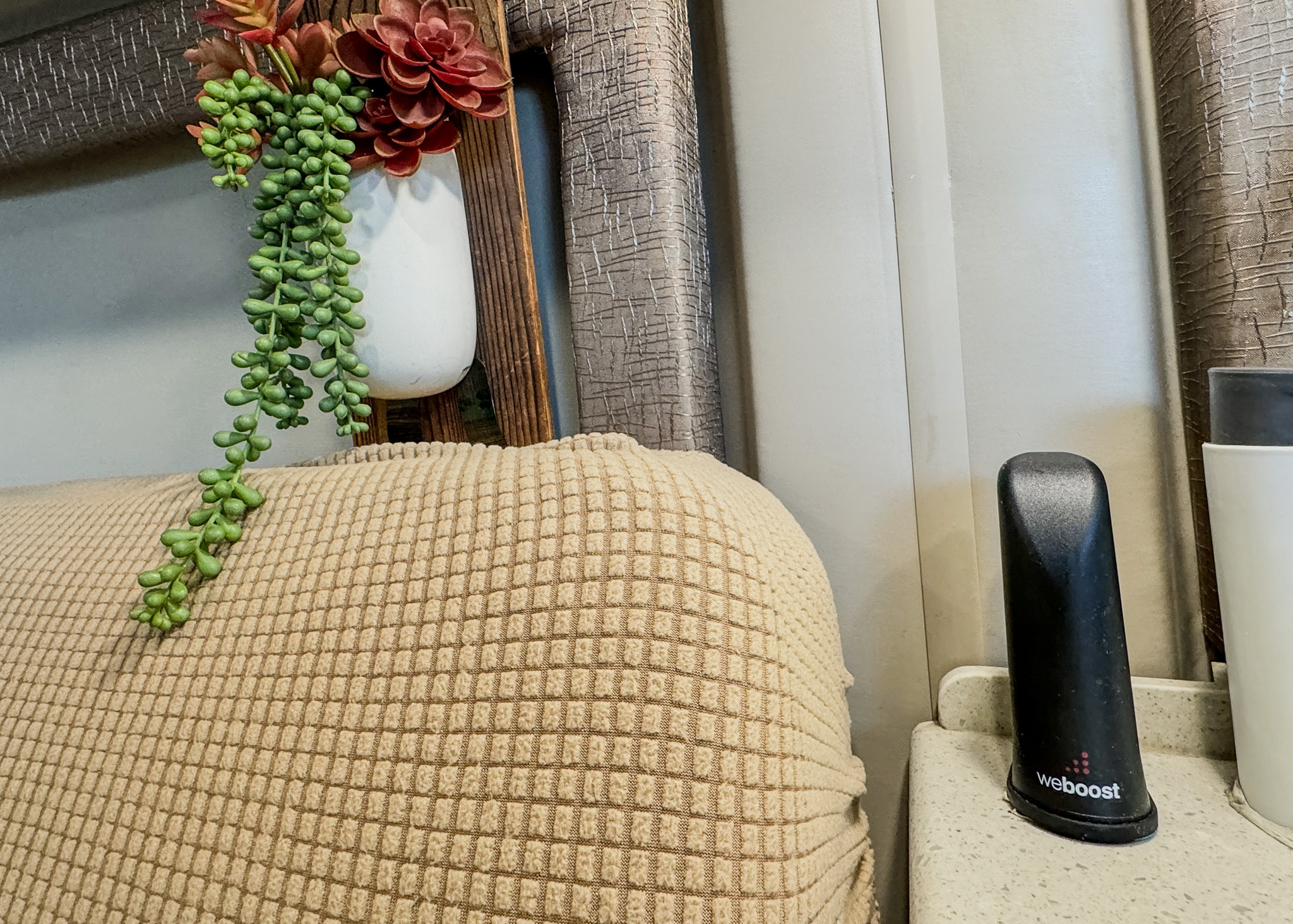 A cell phone booster sits in Gabe and Rocio Rivero's Thor Motor Coach Sequence.