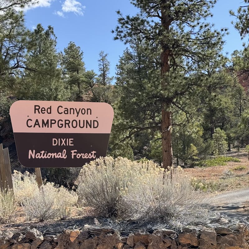 A close-up of the Red Canyon Campground, Dixie National Forest sign.