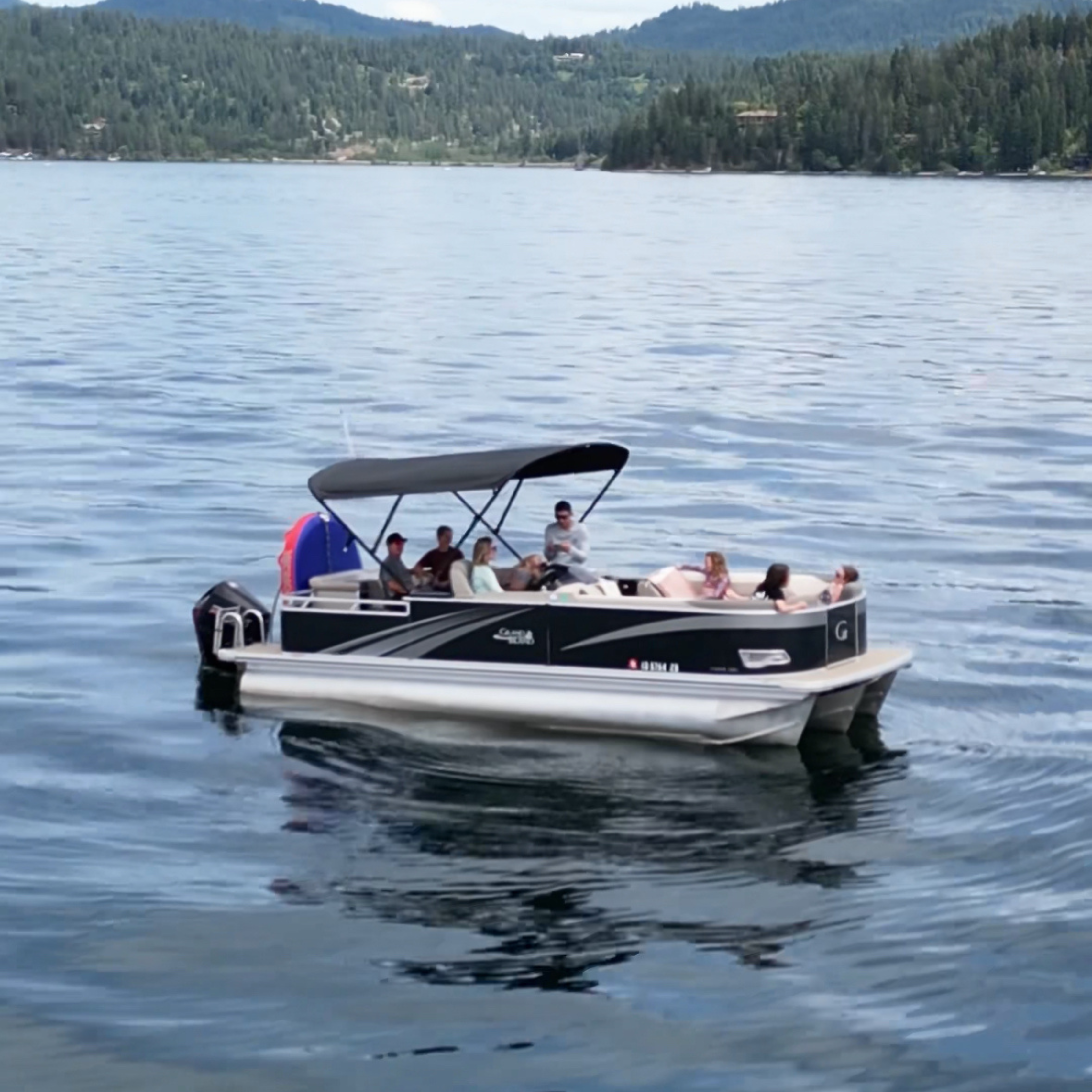 Ashley Peeples and her family cruise on a boat 