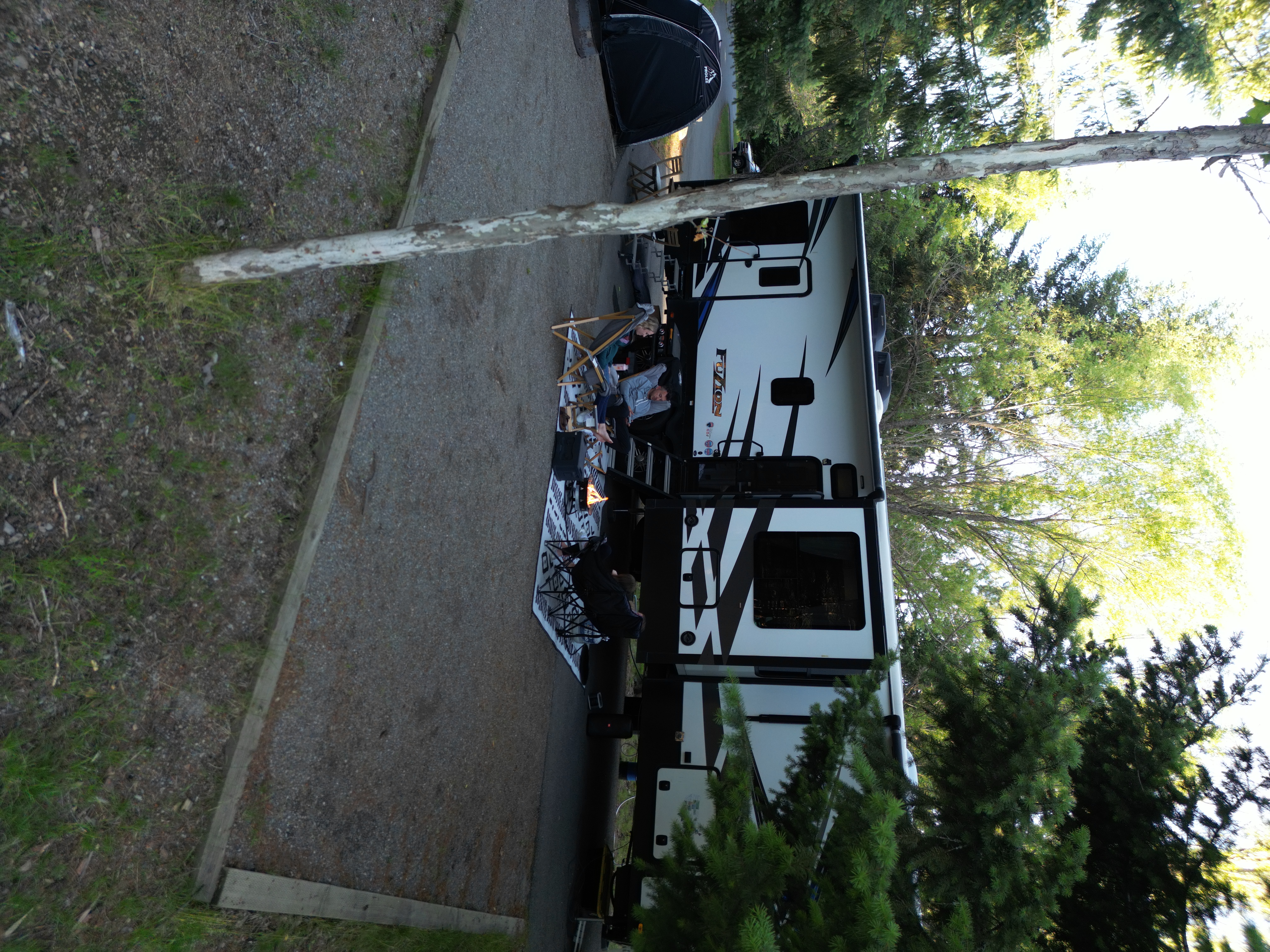 Ashley Peeples and her family gather around a campfire in the Idaho Panhandle National Forest.
