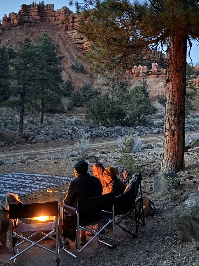 Carrie Cassity and her family surround a campfire.