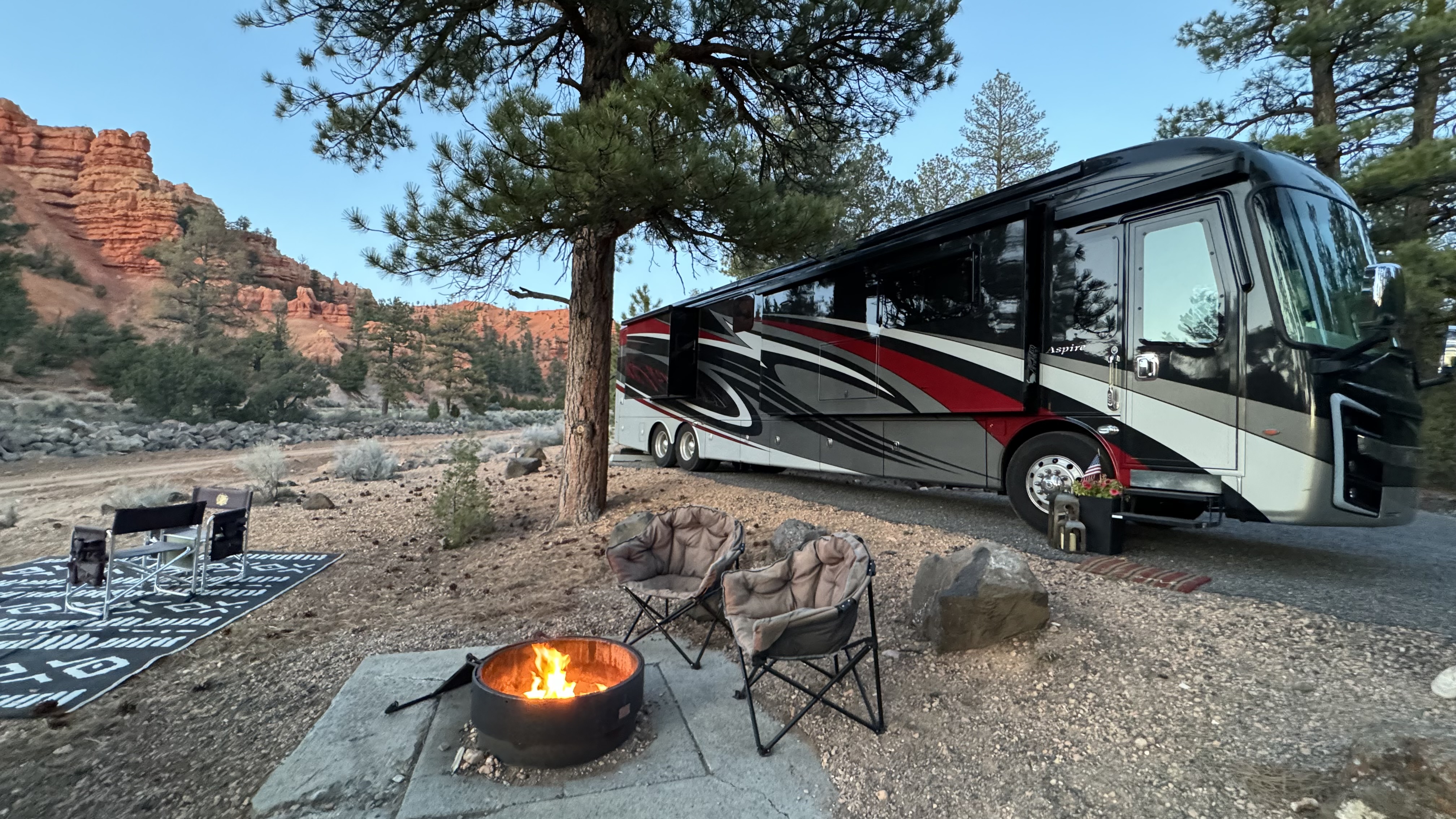 Carrie Cassity's Entegra Aspire Class A motorhome at a campsite.