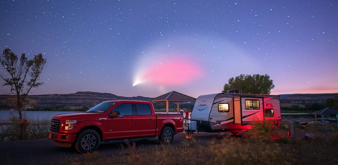 A starry night sky at Escalante Petrified Forest State Park with Jason and Alison Takacs's Jayco Jay Flight.