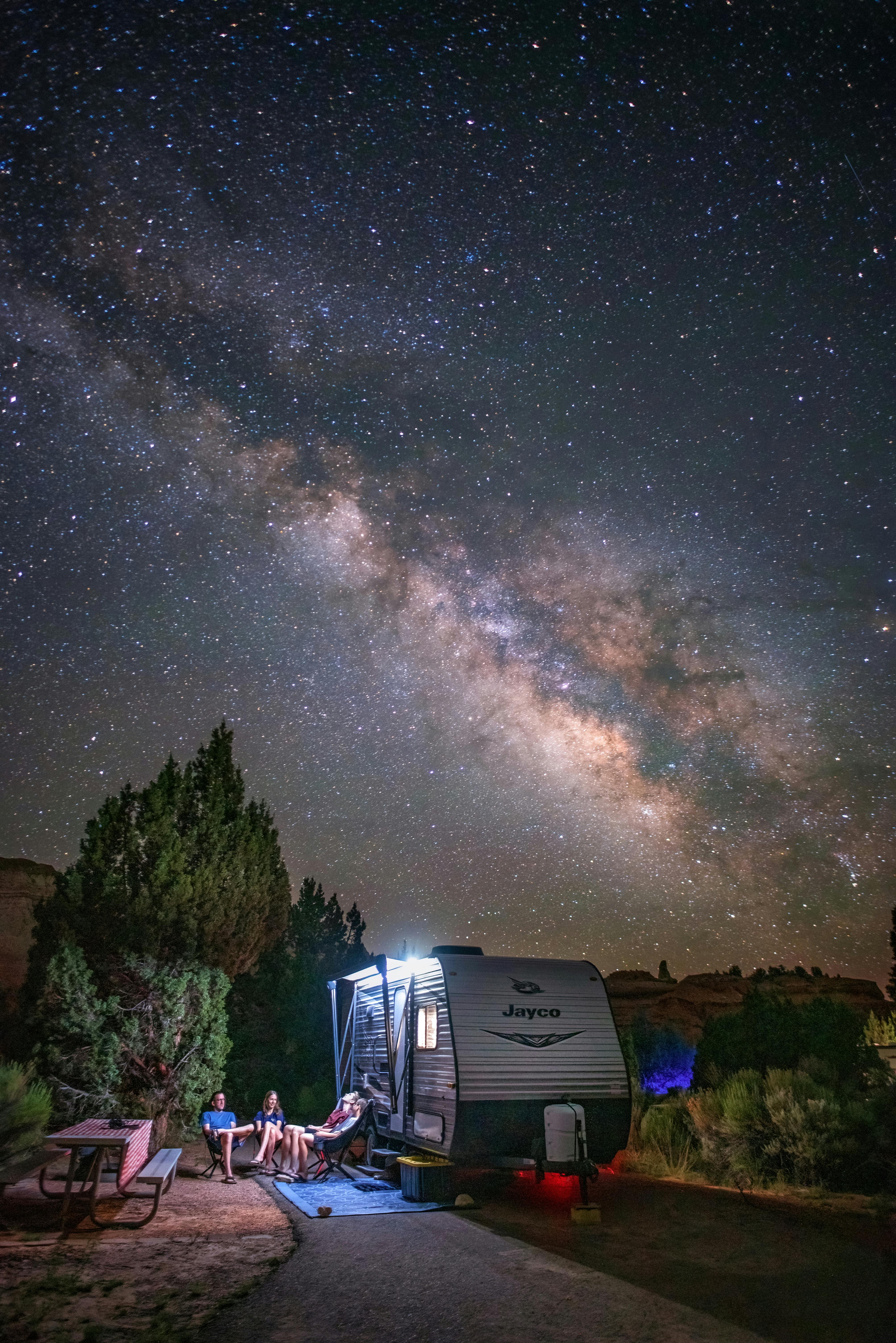 A starry night sky at a campsite in Kodachrome Basin State Park, featuring Jason and Alison Takacs's Jayco Jay Flight travel trailer.