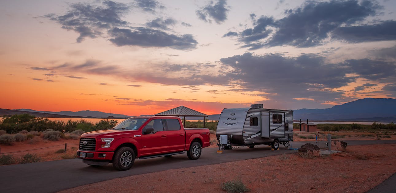 A sunset at a campsite in Sand Hollow State Park with Jason and Alison Takacs's Jayco Jay Flight travel trailer.