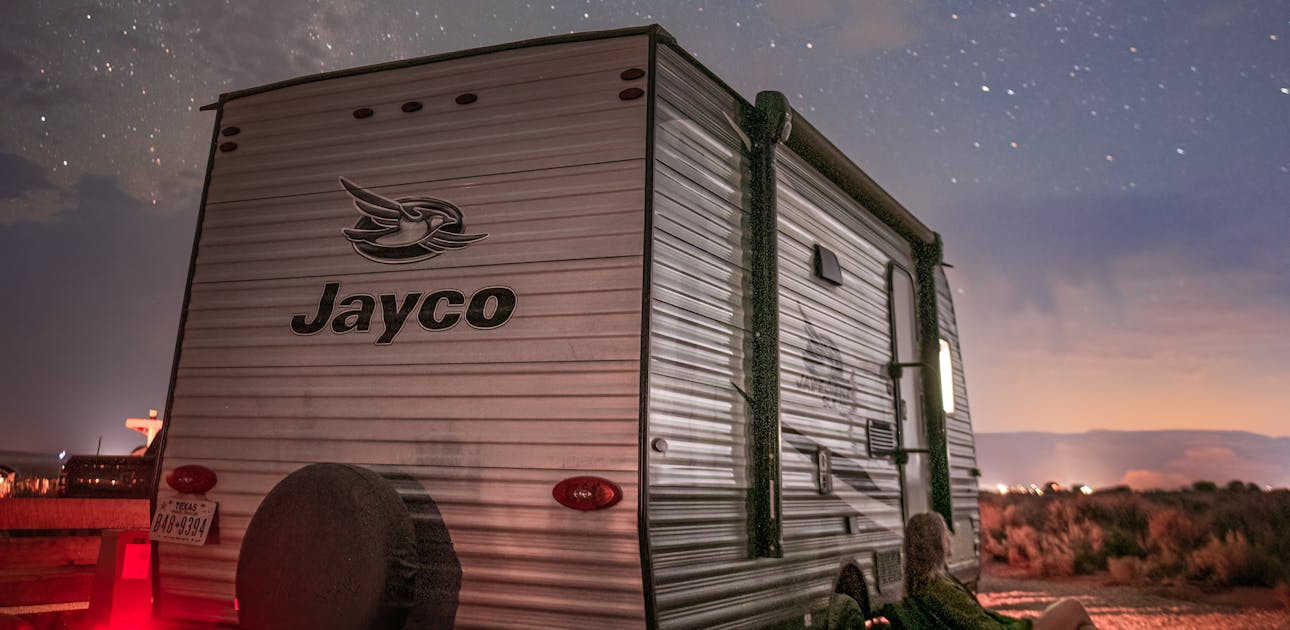 Jason and Alison Takacs's Jayco Jay Flight travel trailer underneath a starry night sky.