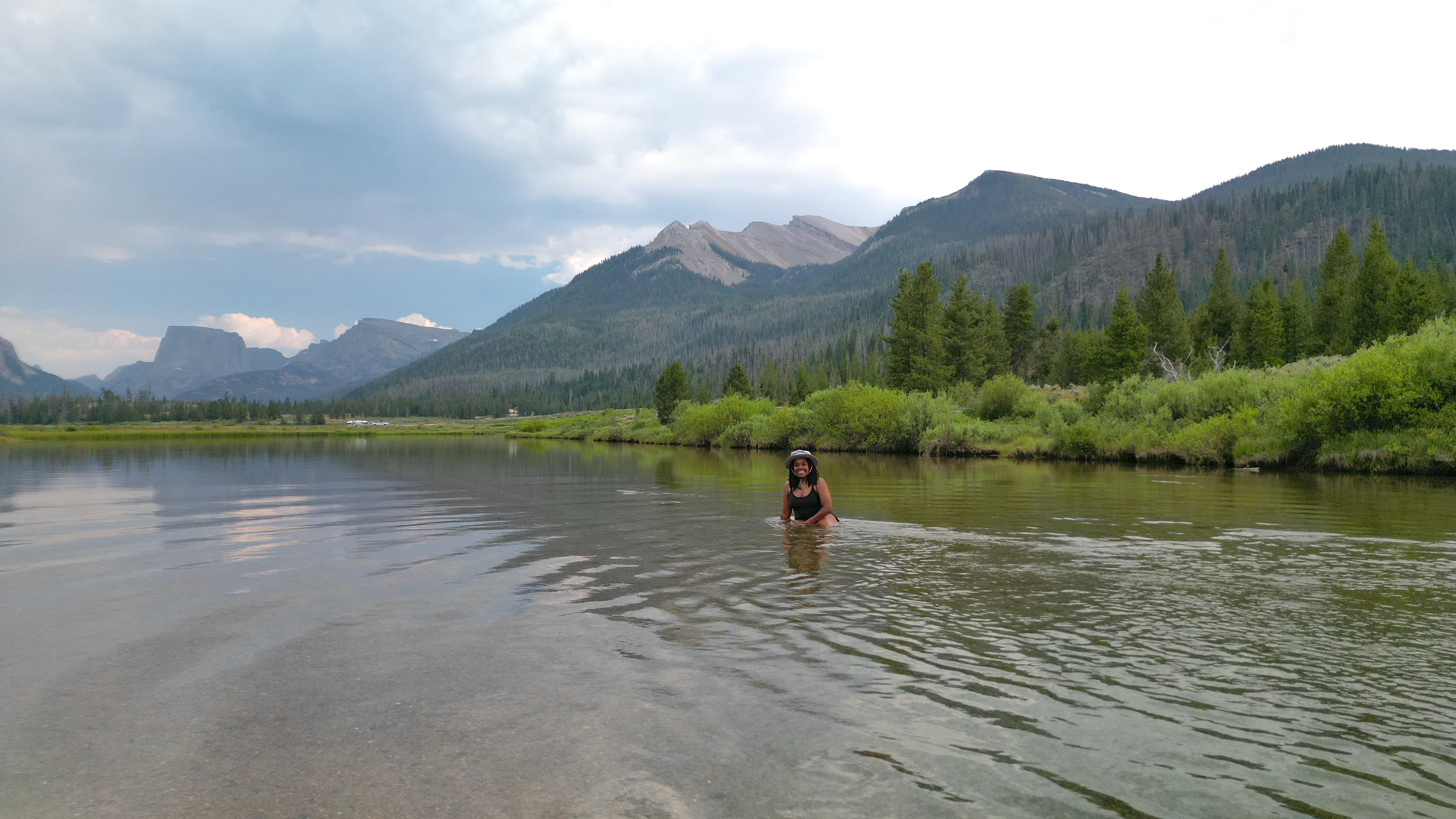 Sherise Gumbs wades through Green River in Bridger-Teton National Forest.