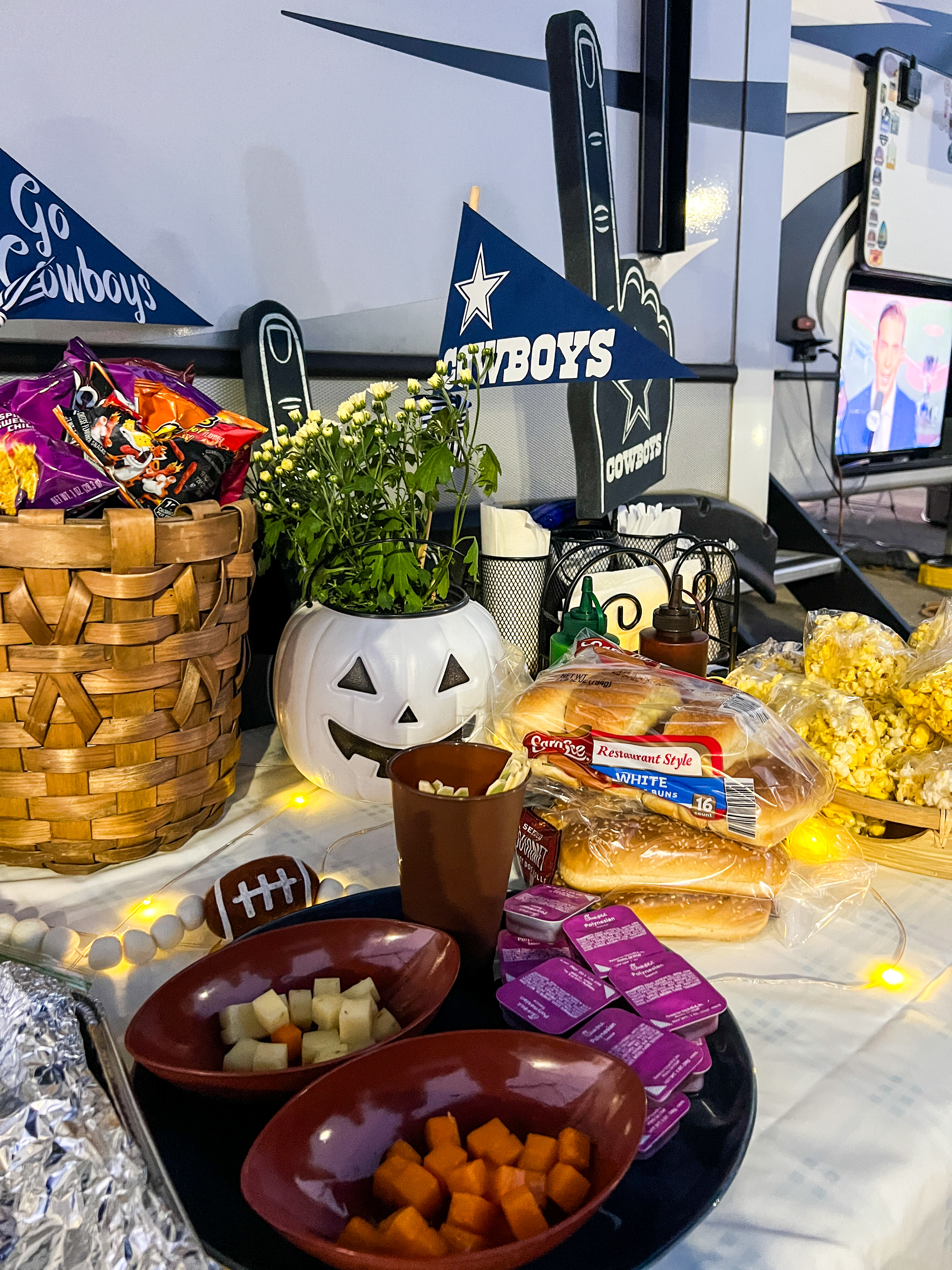 A food spread at Donny and Tammy Benedict's Keystone Cougar fifth wheel tailgating set-up.