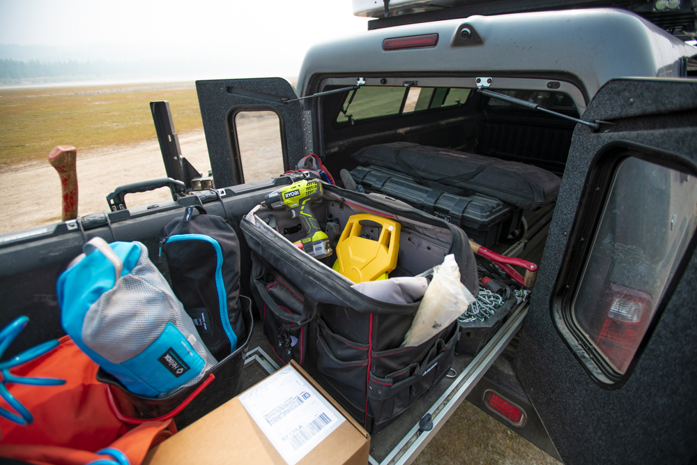 A shot of different tools and gear that would be helpful for hunting.