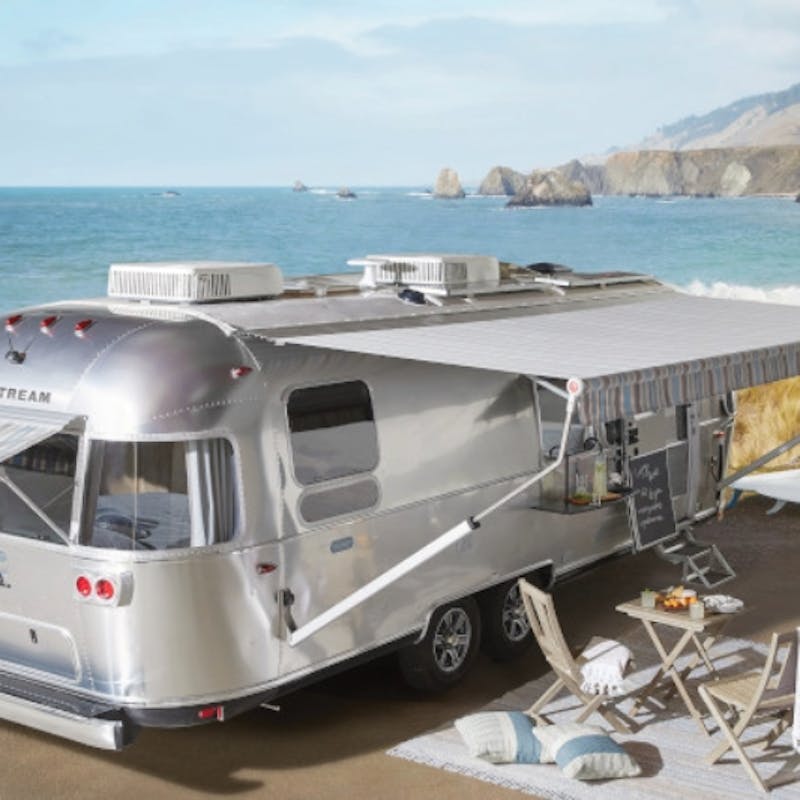 Airstream Pottery Barn exterior in front of an ocean.