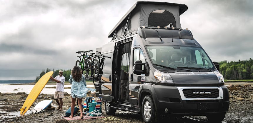 A couplet sets up camp outside of a Thor Motor Coach Scope Class B Camper Van
