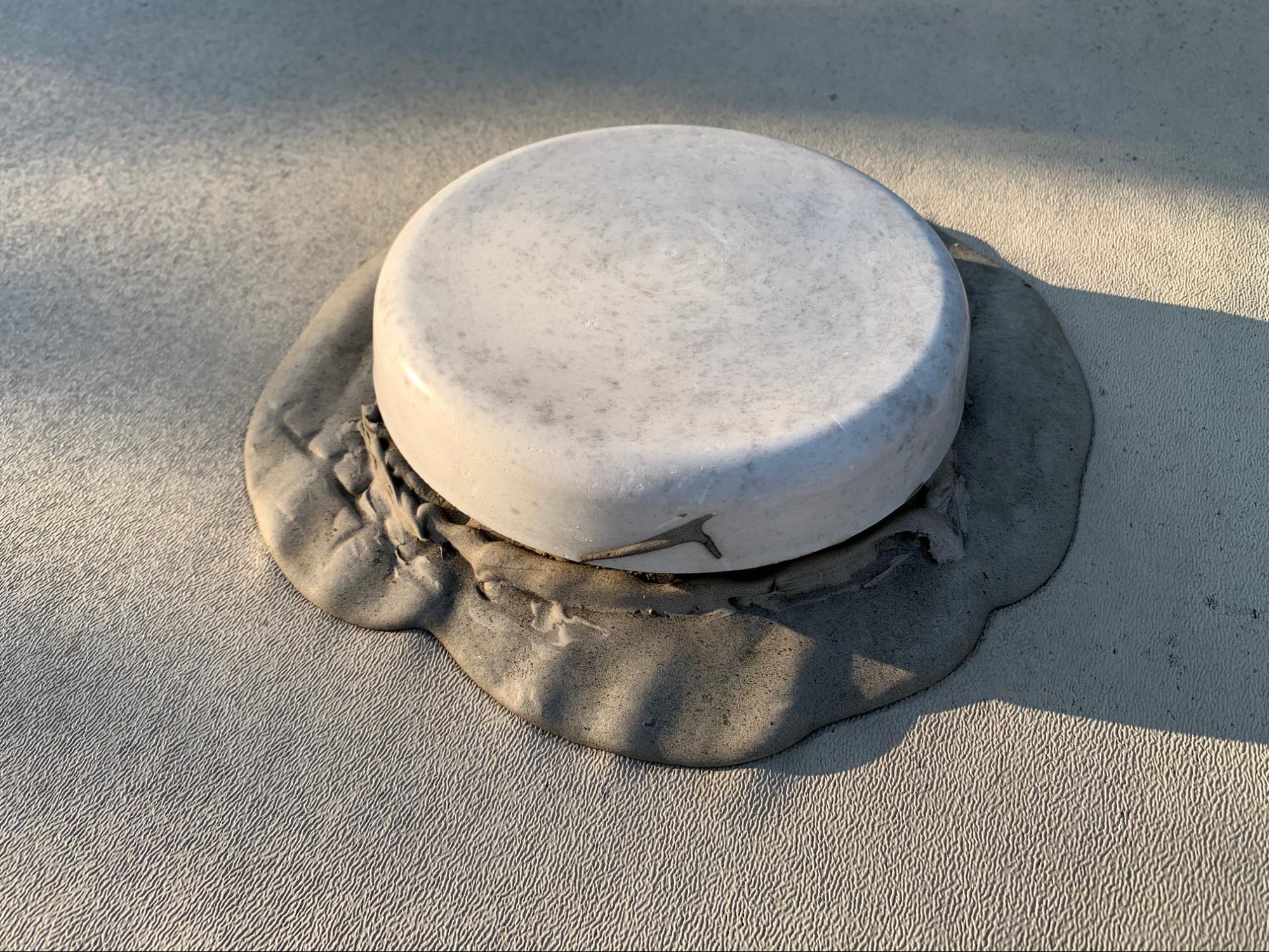 Tom Boswell showing the seals on the roof of his RV.