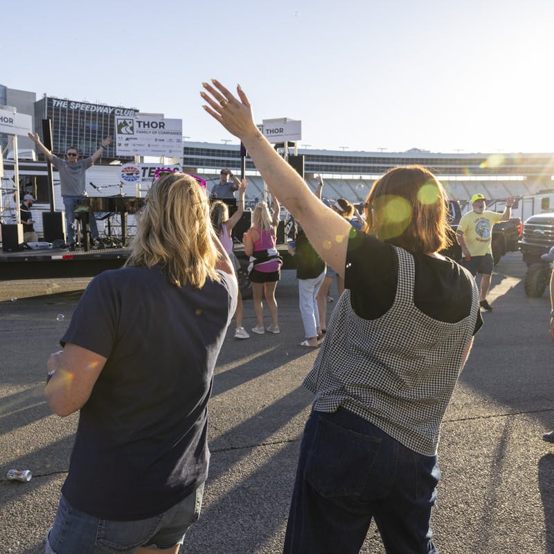 Two women dancing at the THOR camper party at Texas Motor Speedway with dueling pianos