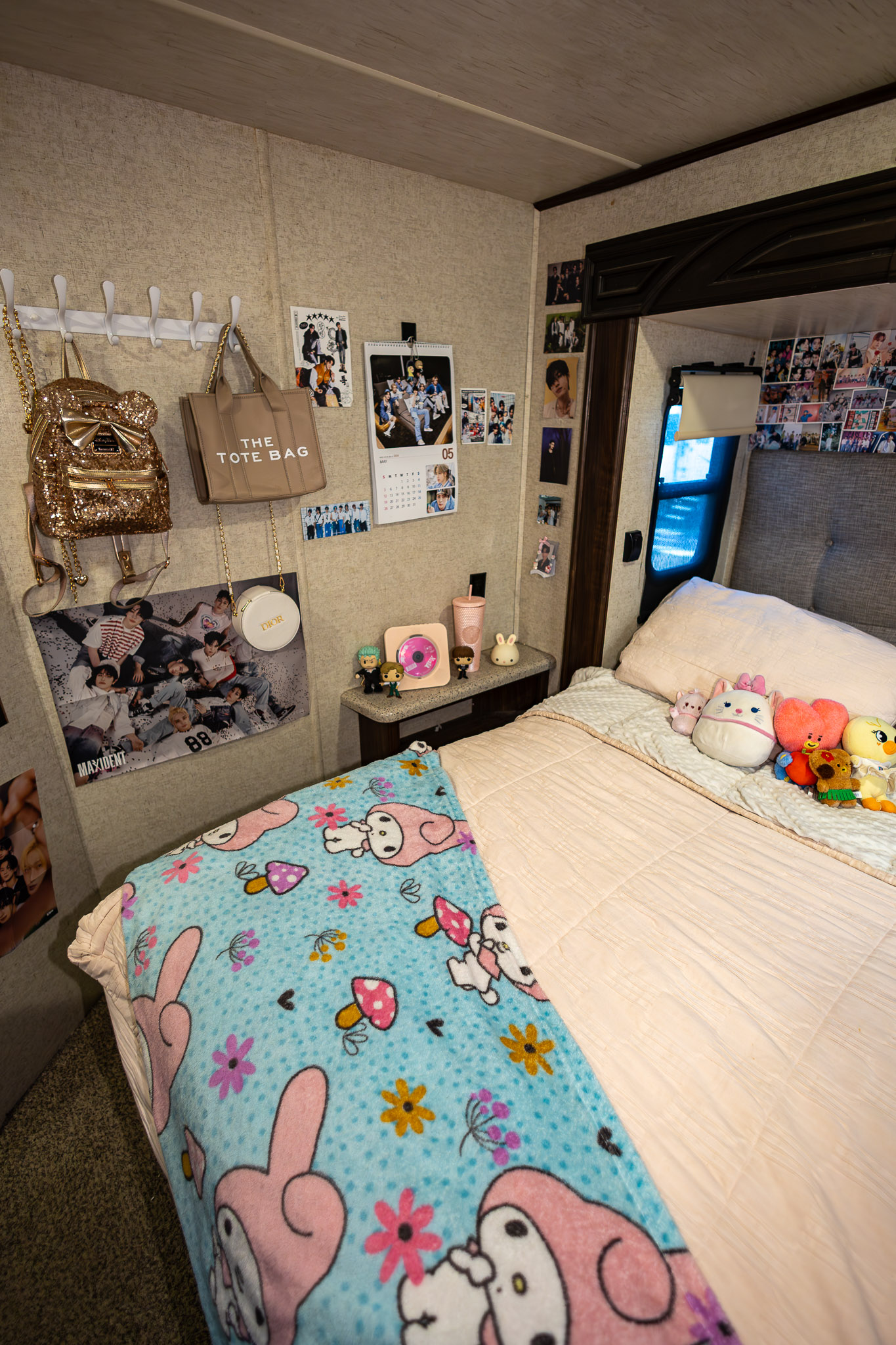 The main bedroom inside the Saul's toy hauler where a teen girl sleeps