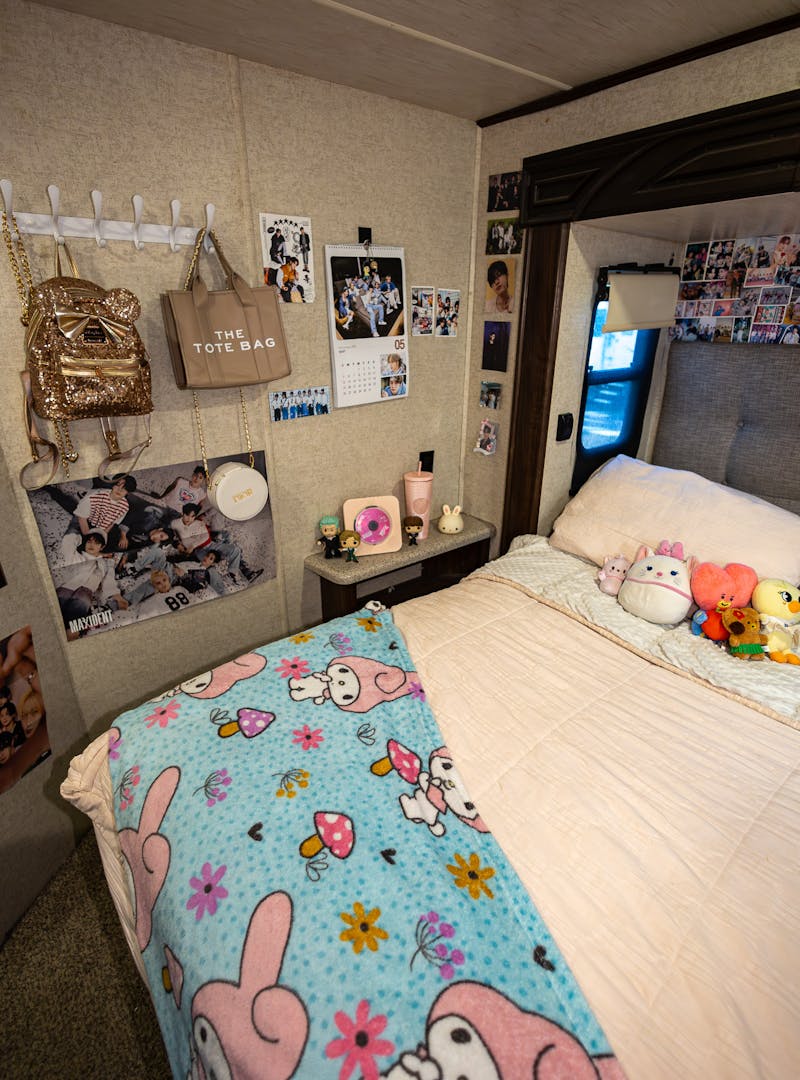 The main bedroom inside the Saul's toy hauler where a teen girl sleeps