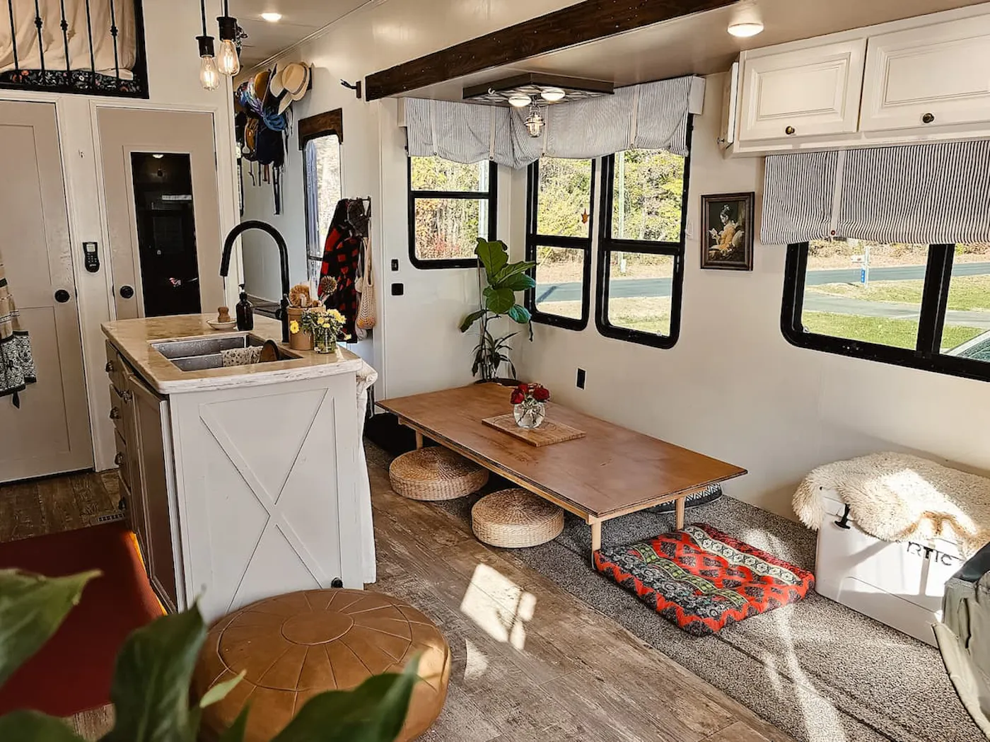 The kitchen and living room inside JC and Barbel (Bibi) Barringer's 2018 KZ Durango Gold fifth-wheel