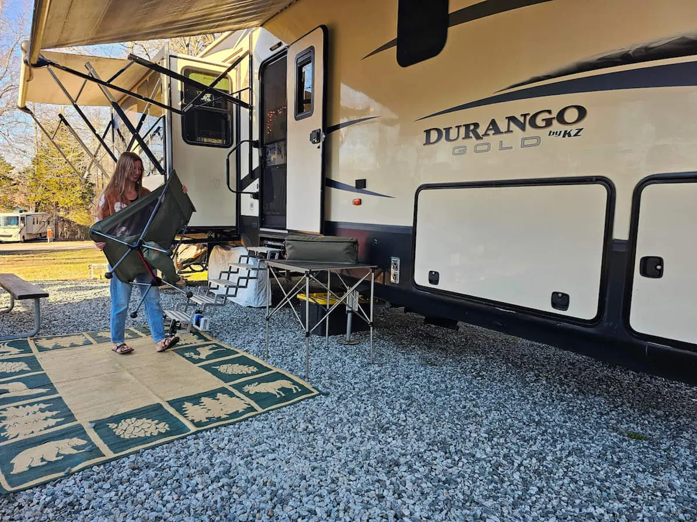 Bibi Barringer packs up a camp chair and patio furniture into her KZ Durango fifth wheel.