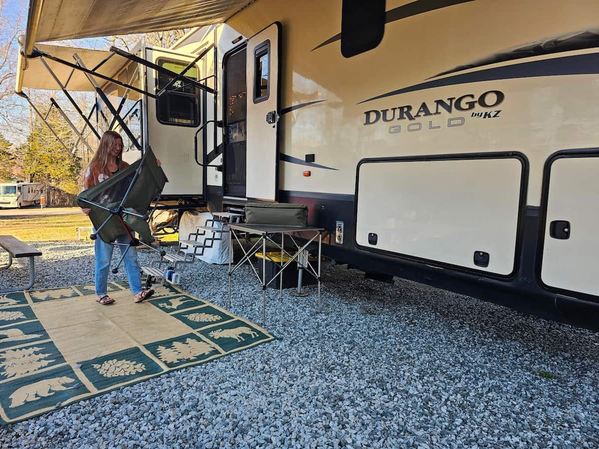 Bibi Barringer packs up a camp chair and patio furniture into her KZ Durango fifth wheel.