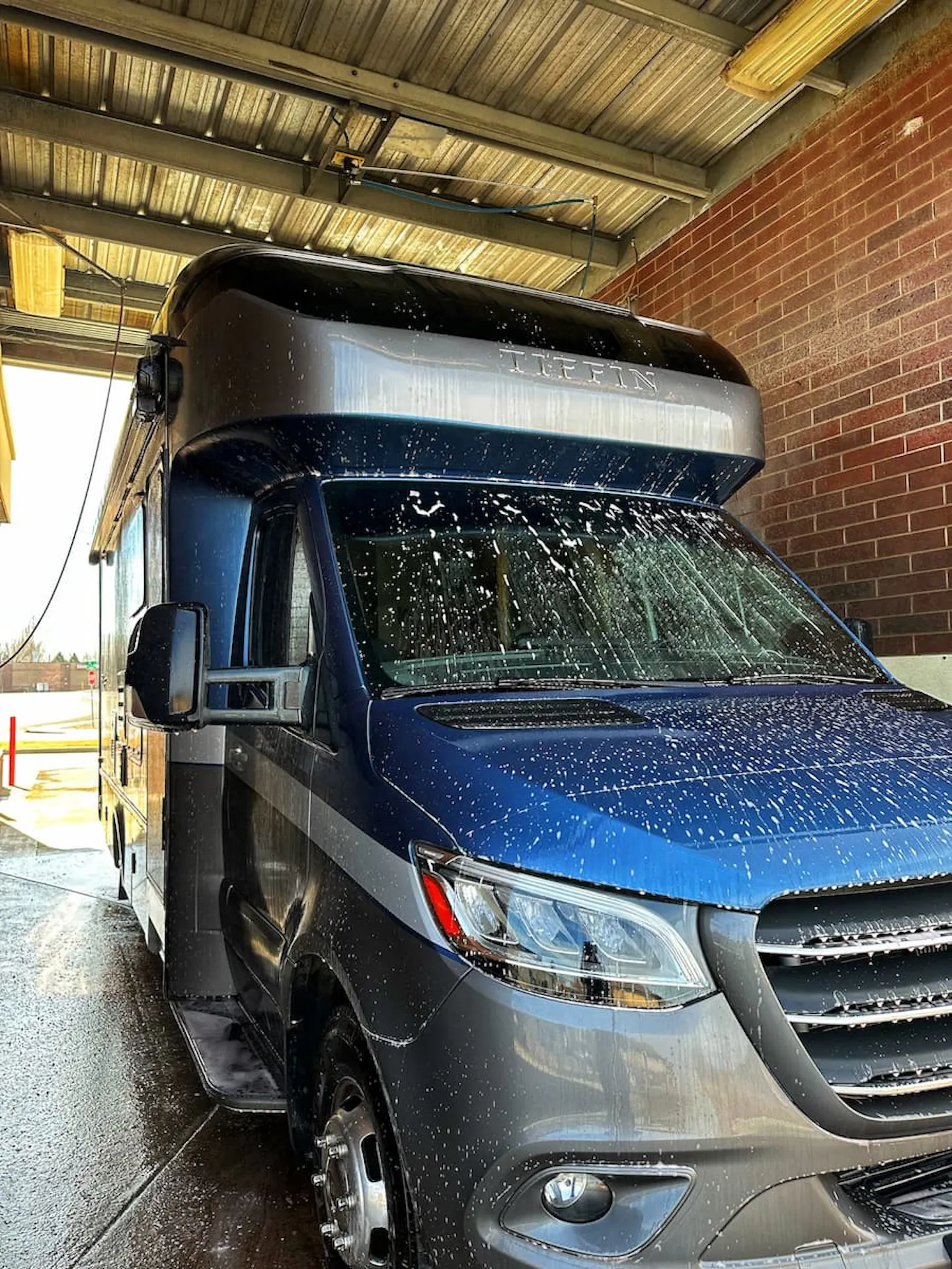 Dustin and Sarah Bauer's RV covered in soapy water.
