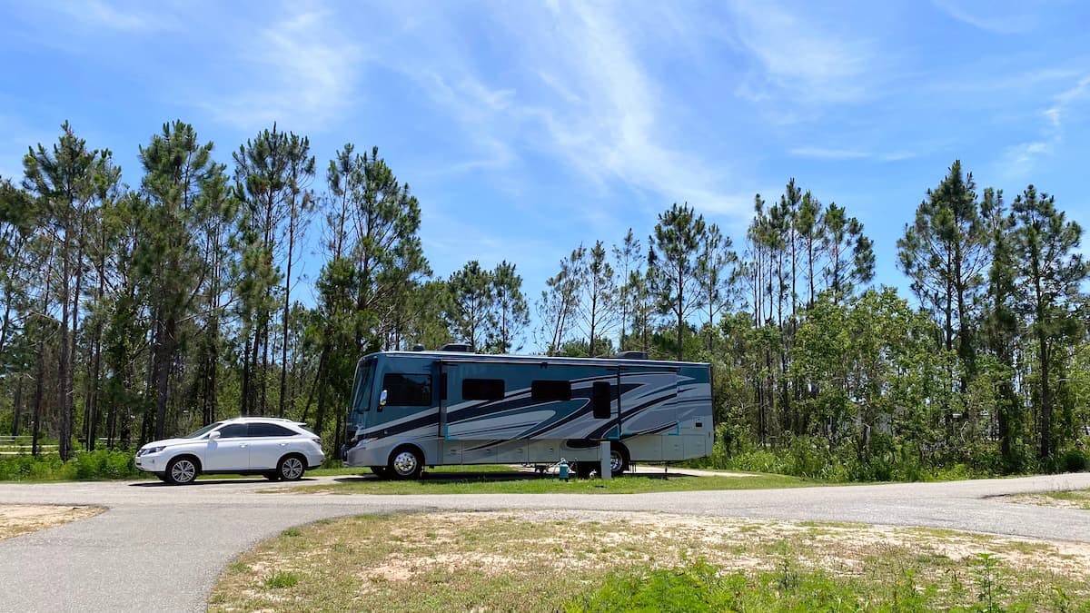 Micheal and Tiffany's RV parked at their campsite near the beach.