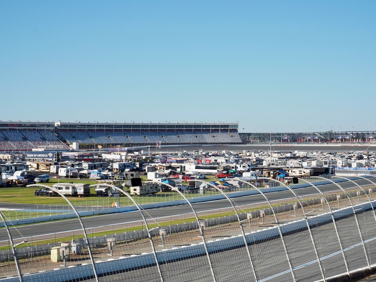 A view of the racetrack and infield RV camping at the Charlotte Motor Speedway in the day.