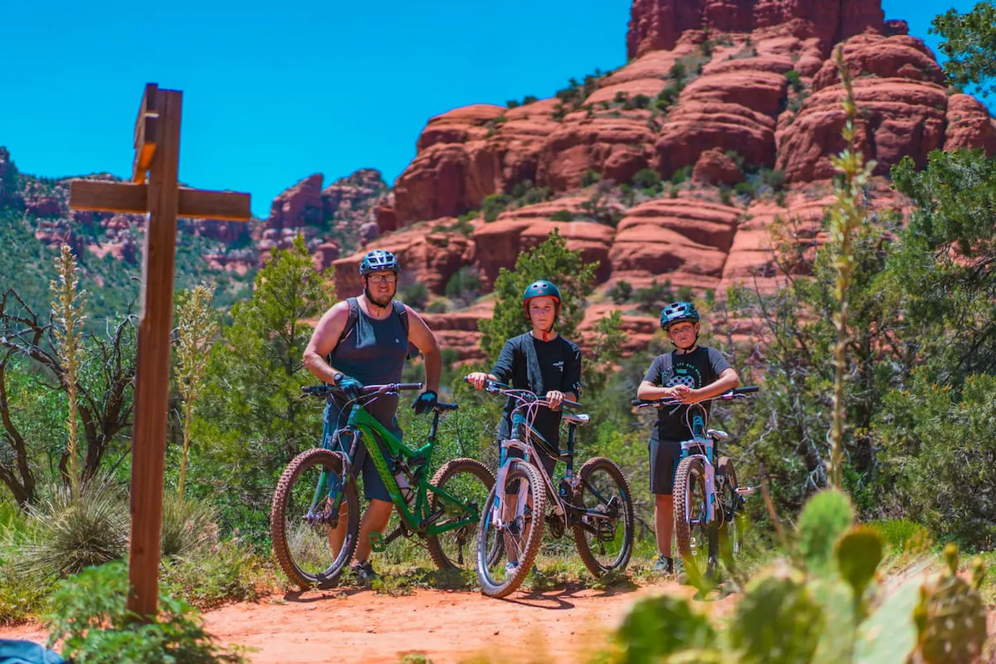 Renee Tilby's husband and children mountain biking in coconino national forest.