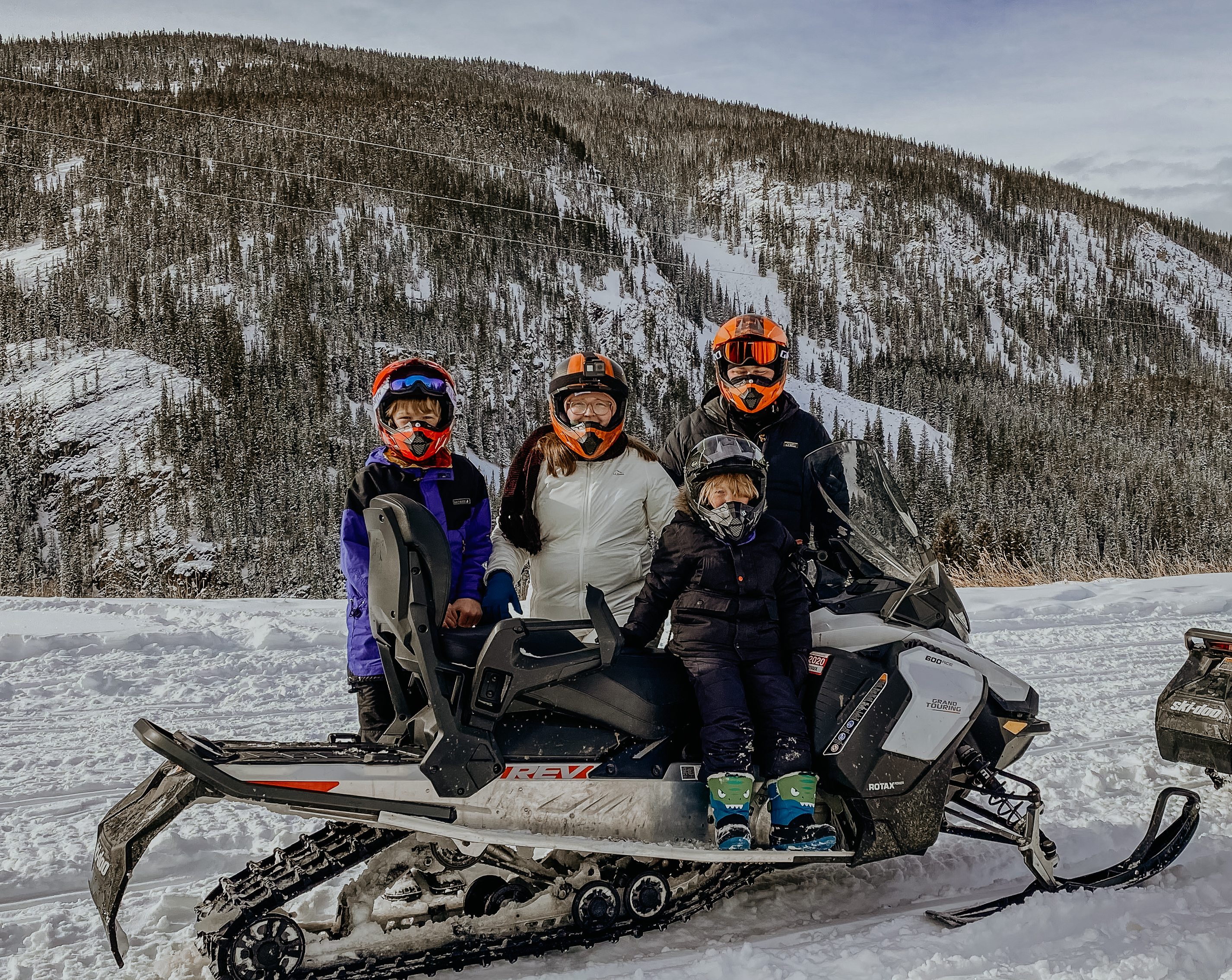 Our family loves trying new things, like snowmobile rides in the winter.