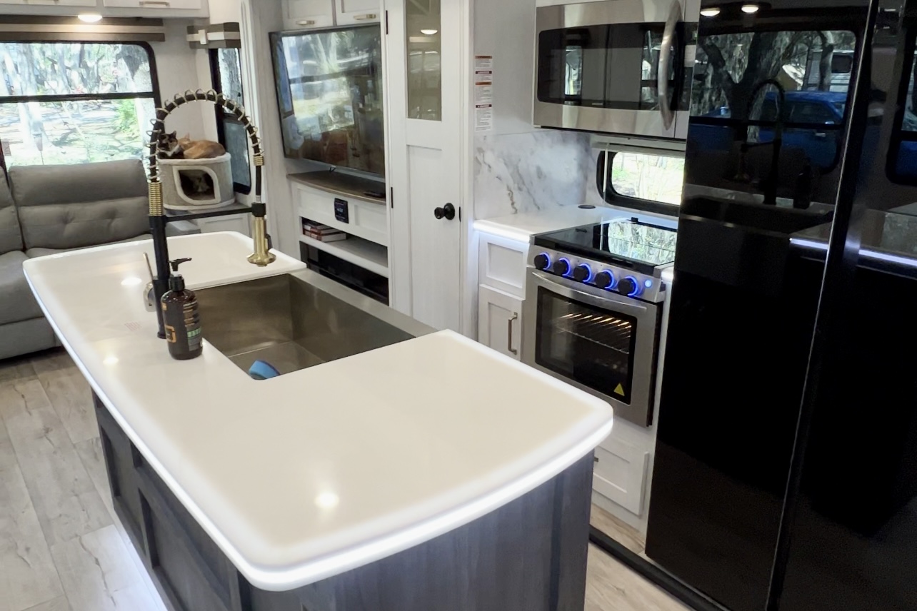 The kitchen inside Bailey and Nicole Damberg's Dutchmen Astoria fifth wheel 