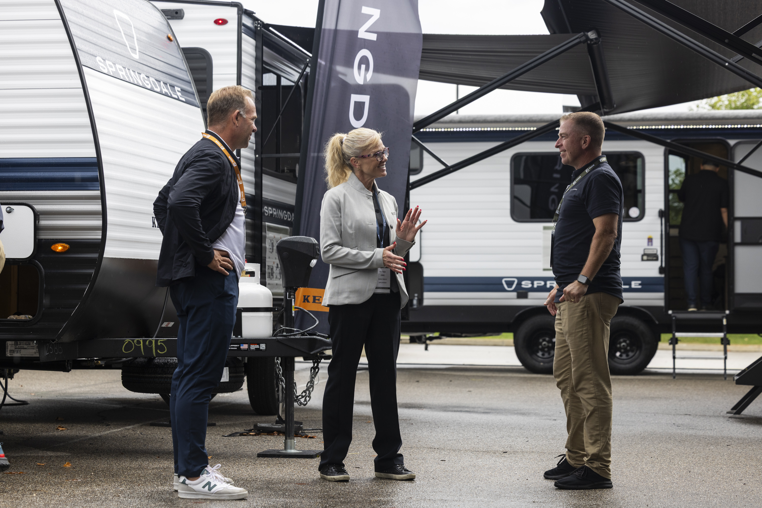 An RV representative talking to RV dealers 