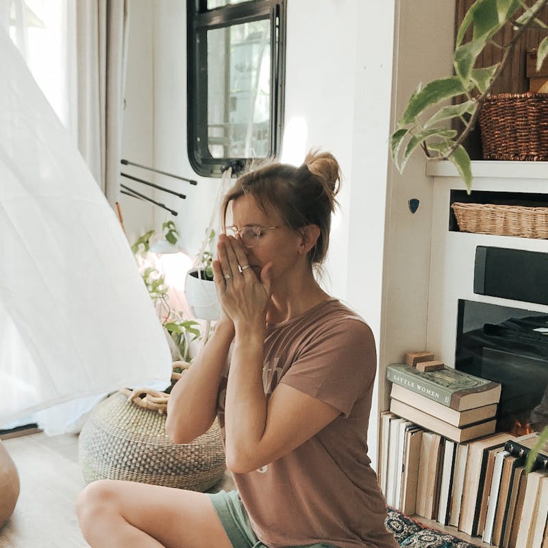 Bibi BARRINGER doing yoga to practice self care