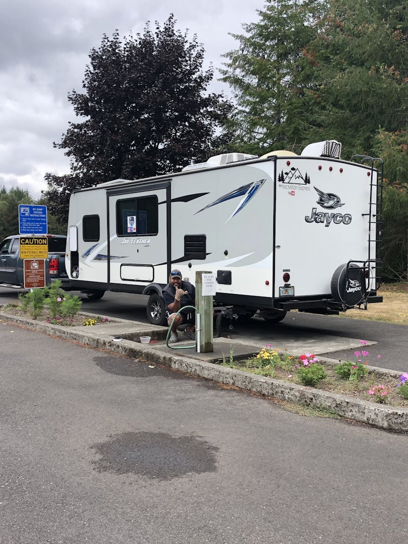 Ben and Christina Dumping and filling their tanks at a station