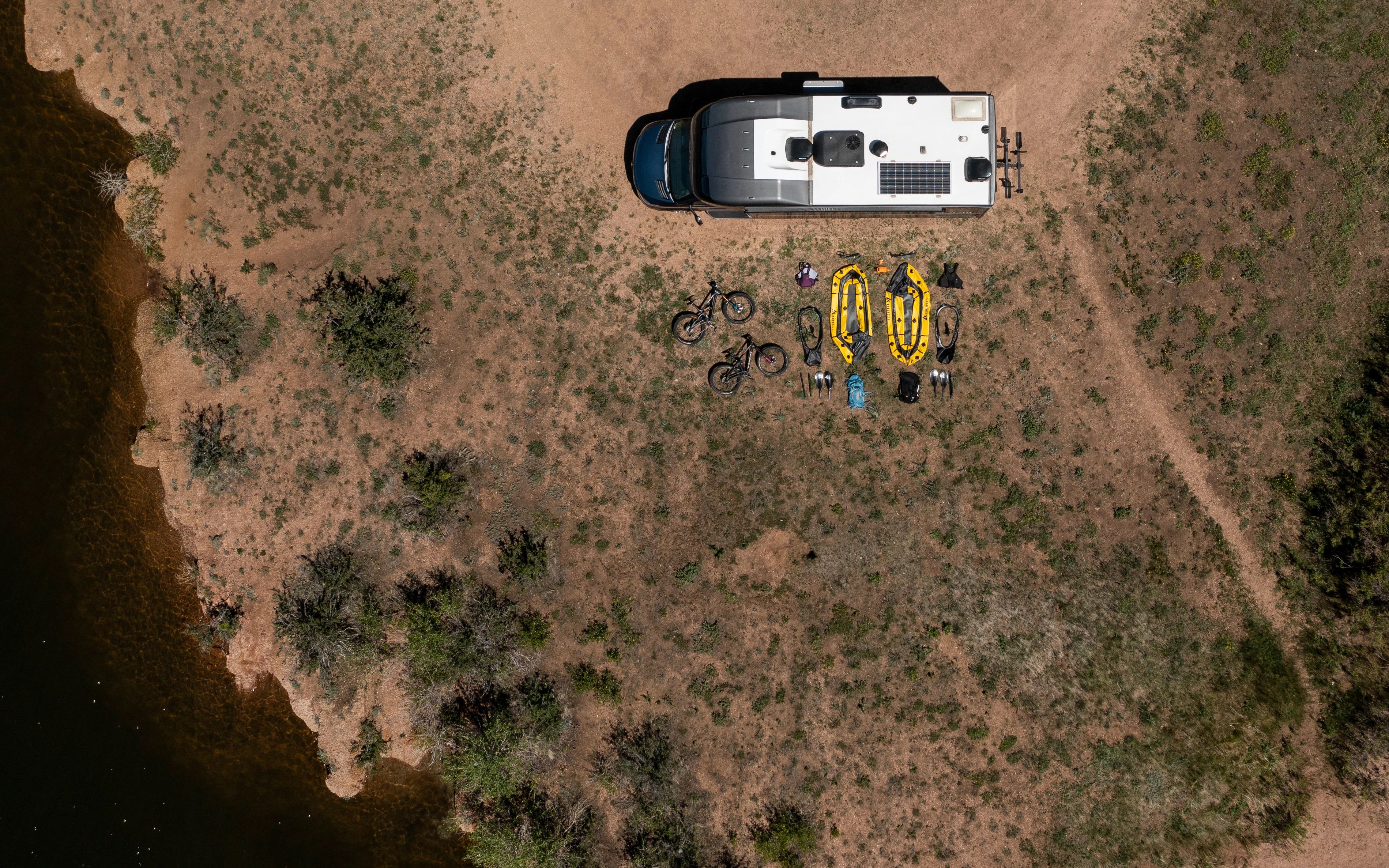 An aerial view of a Tiffin Class C motorhome with a solar panel on the roof