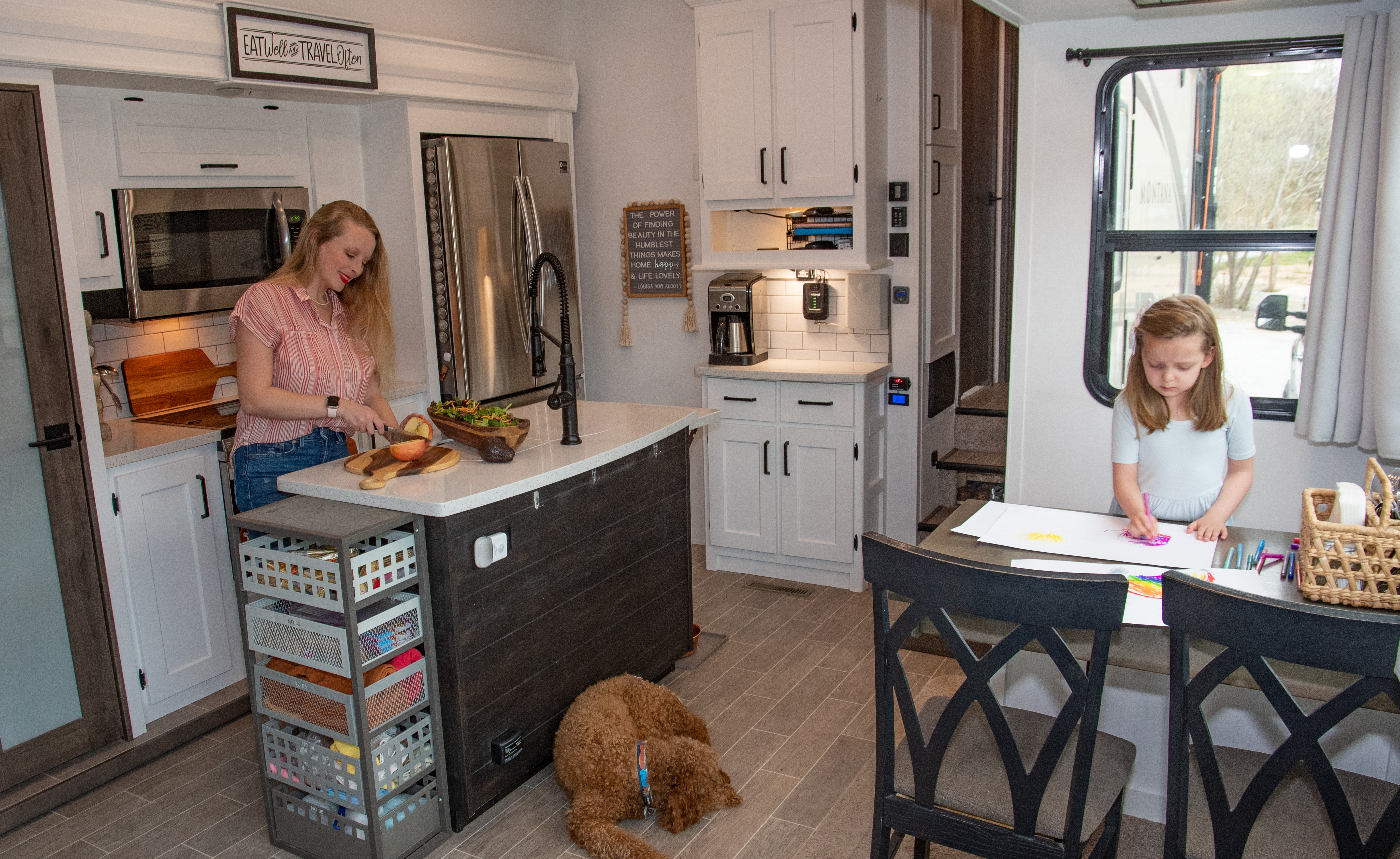 Jama Maples chops food in the kitchen of her Keystone RV.