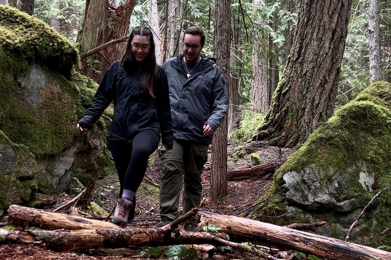 Bailey and Nicole Damberg on a hike in the forest