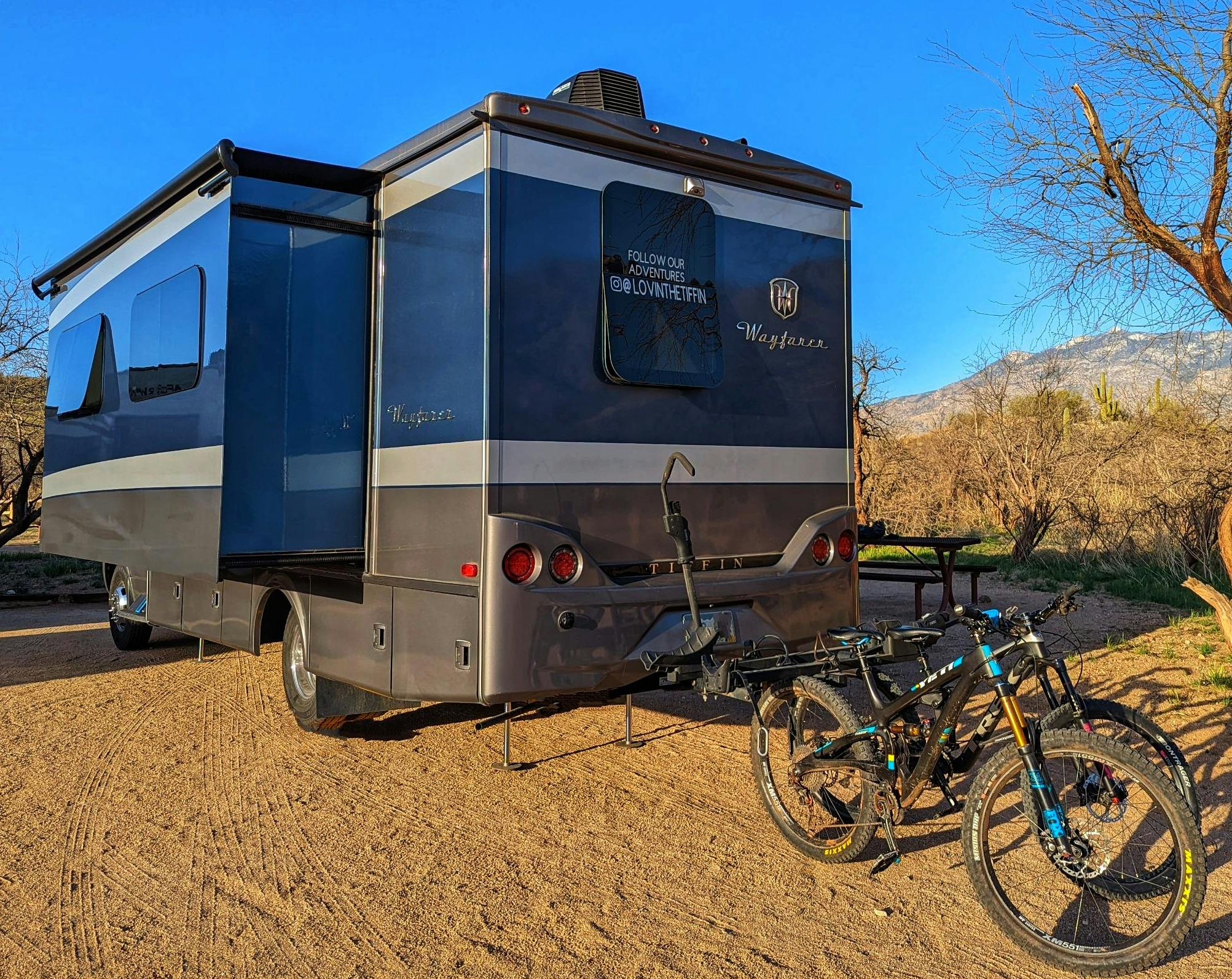 DUSTIN & SARAH BAUER's Tiffin Wayfarer at a campsite 