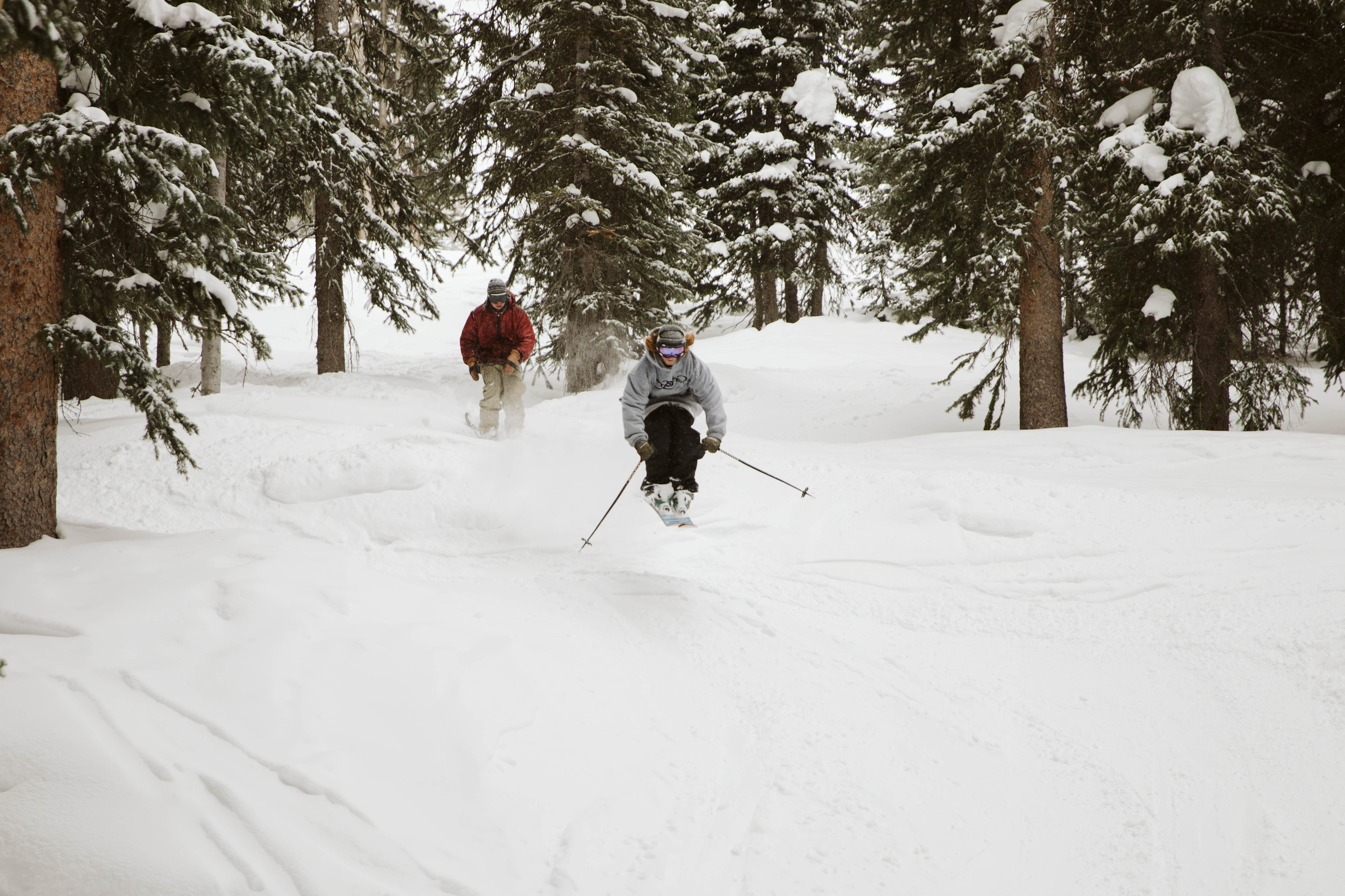 Ryan catching air on a ski slope. 