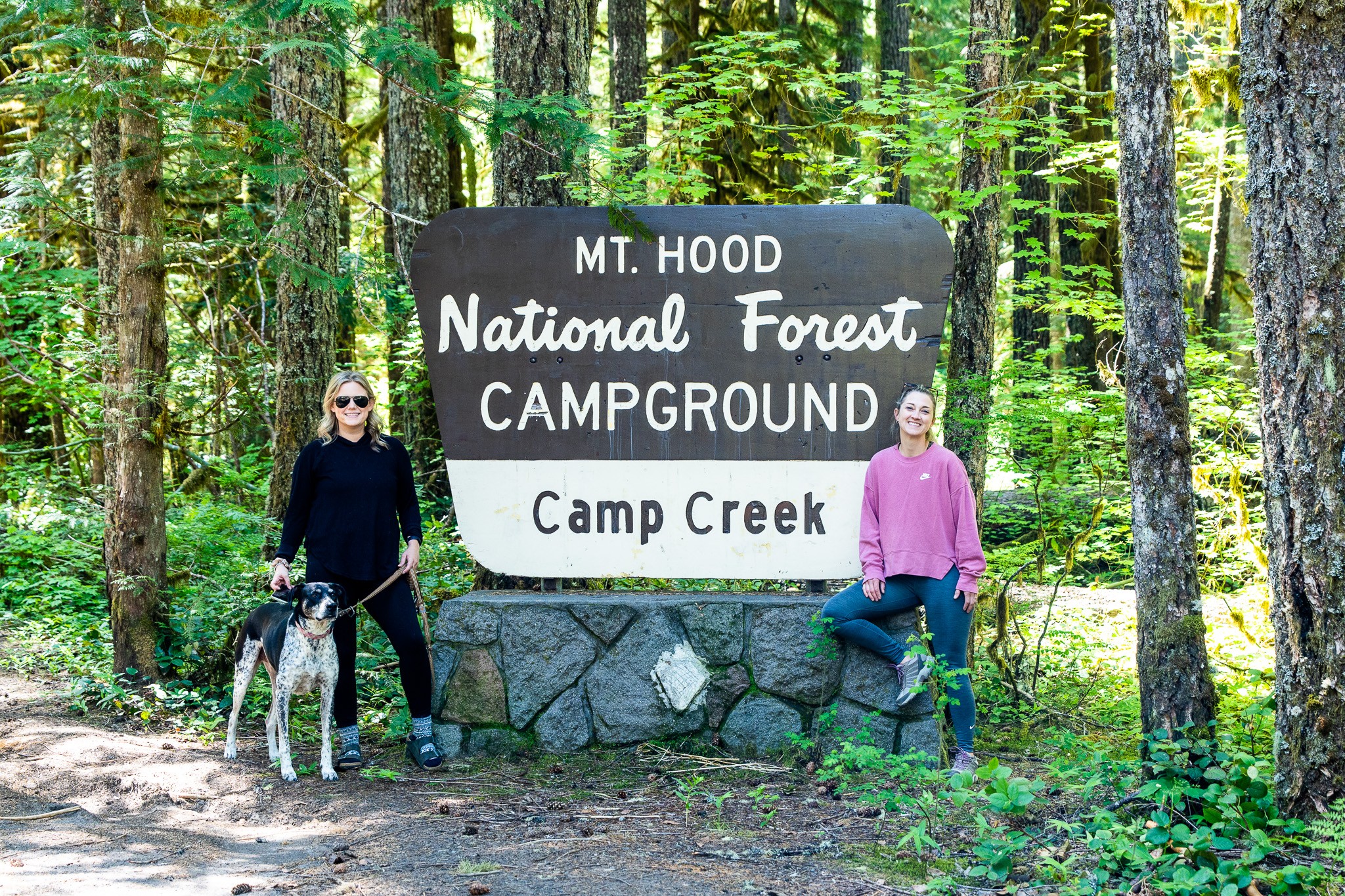Kristy Dobie and her friend at the Mt Hood National Forest campground sign 
