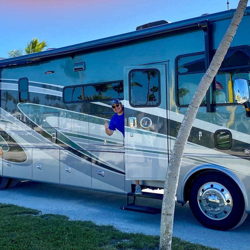 Michael & Tiffany Dunagan's RV parked at a beach campsite