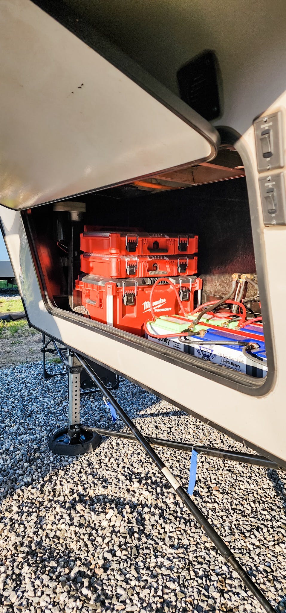 STEVE & KAYLEE TECHAU's exterior storage filled with tools
