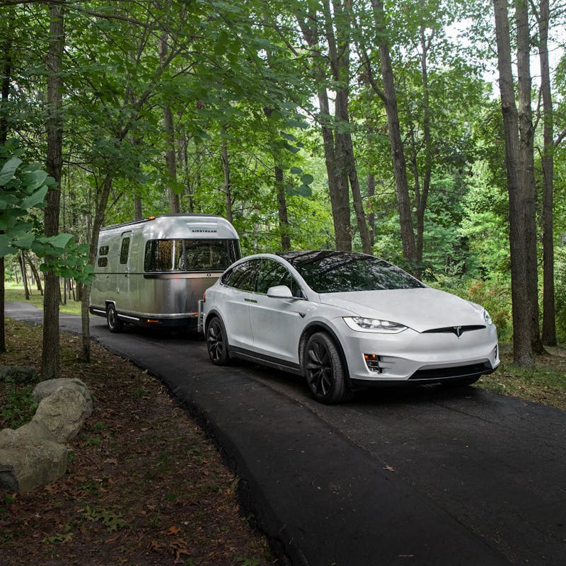 THOR E-Stream being towed by a Tesla