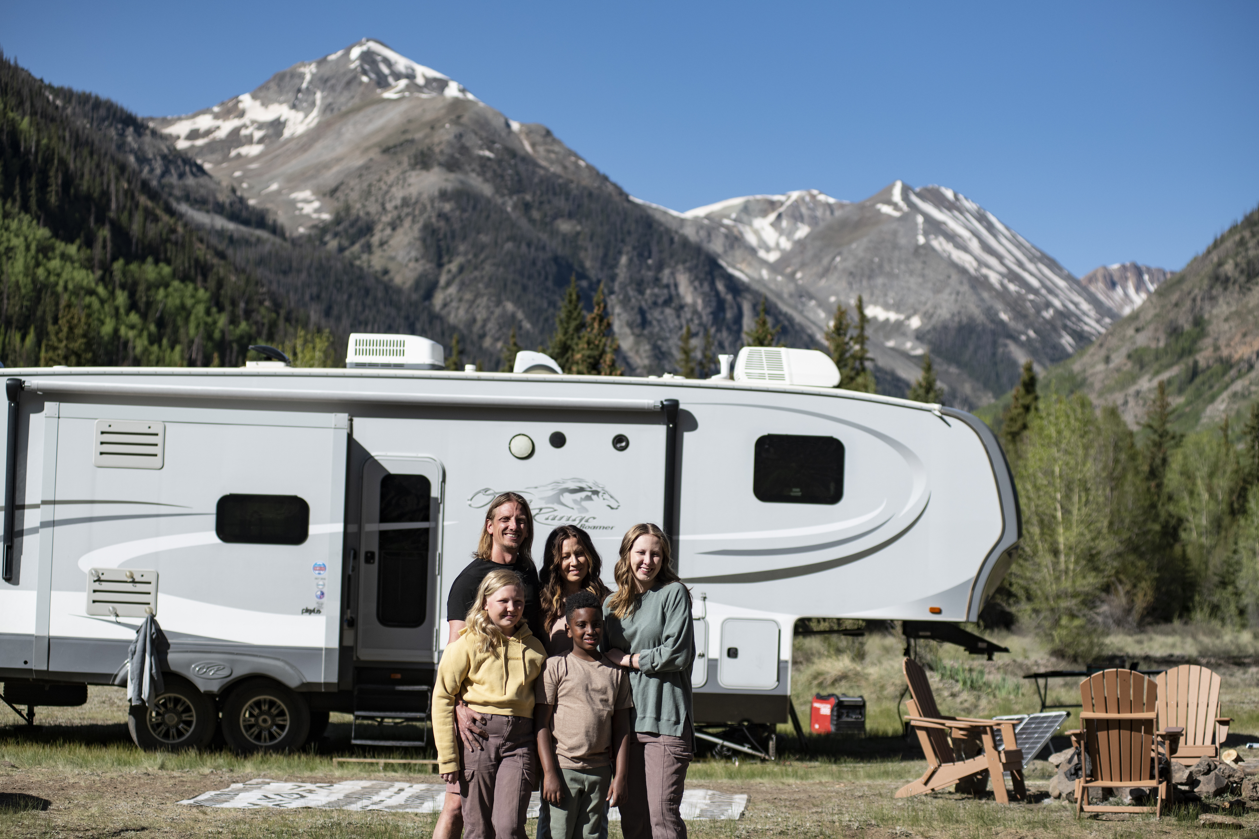 The Carew family portrait in front of their RV