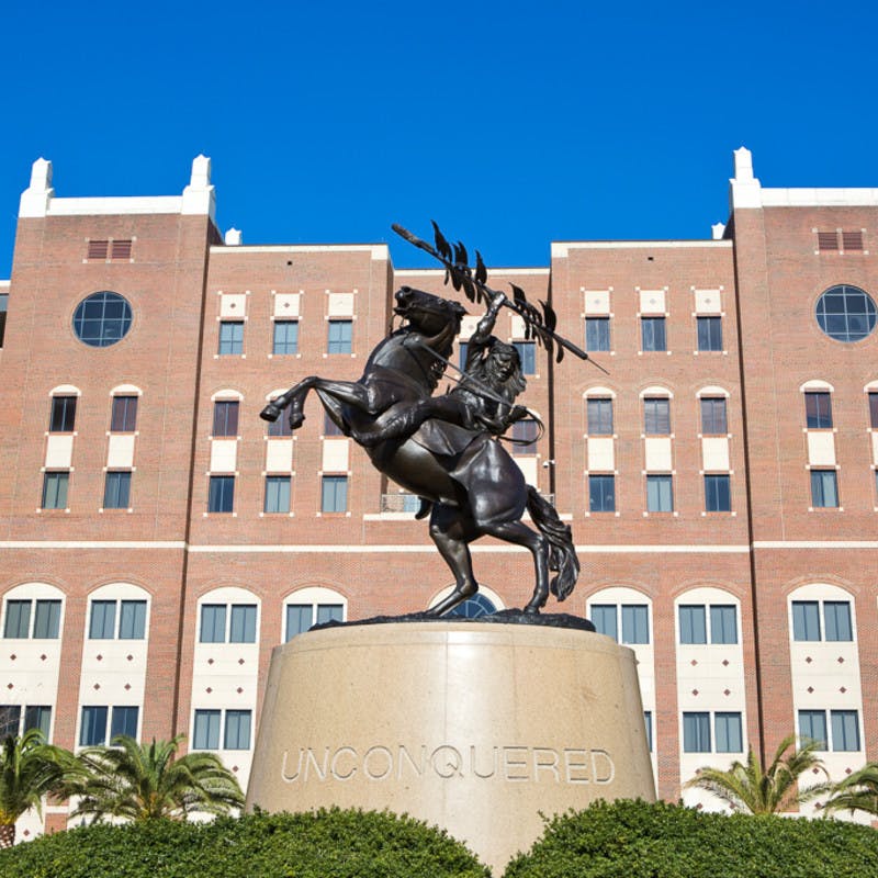 Bronze “Unconquered” statue at the south entrance of Doak S. Campbell Stadium at Florida State University in Tallahassee, Florida.