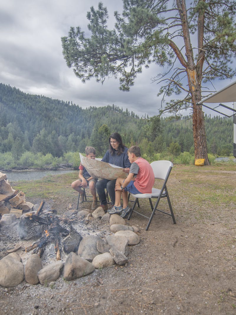 Chelsea Day looking at a map with her kids