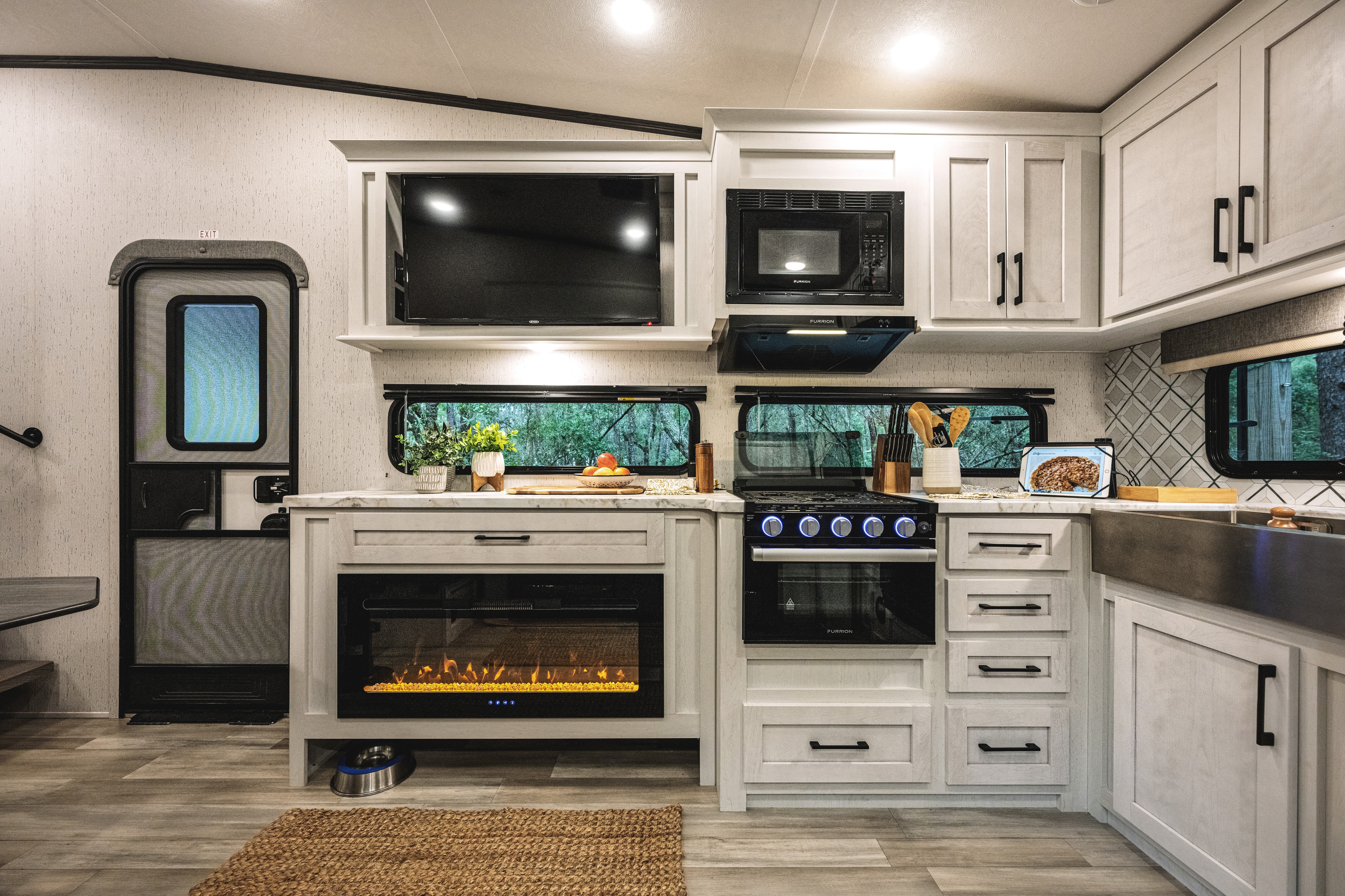 The kitchen inside a Dutchmen Astoria Fifth Wheel.