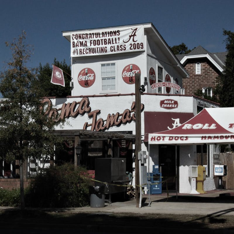 Rama Jama's classic diner restaurant near University of Alabama in Tuscaloosa, Alabama with Roll Tide football and Coca-Cola signs.
